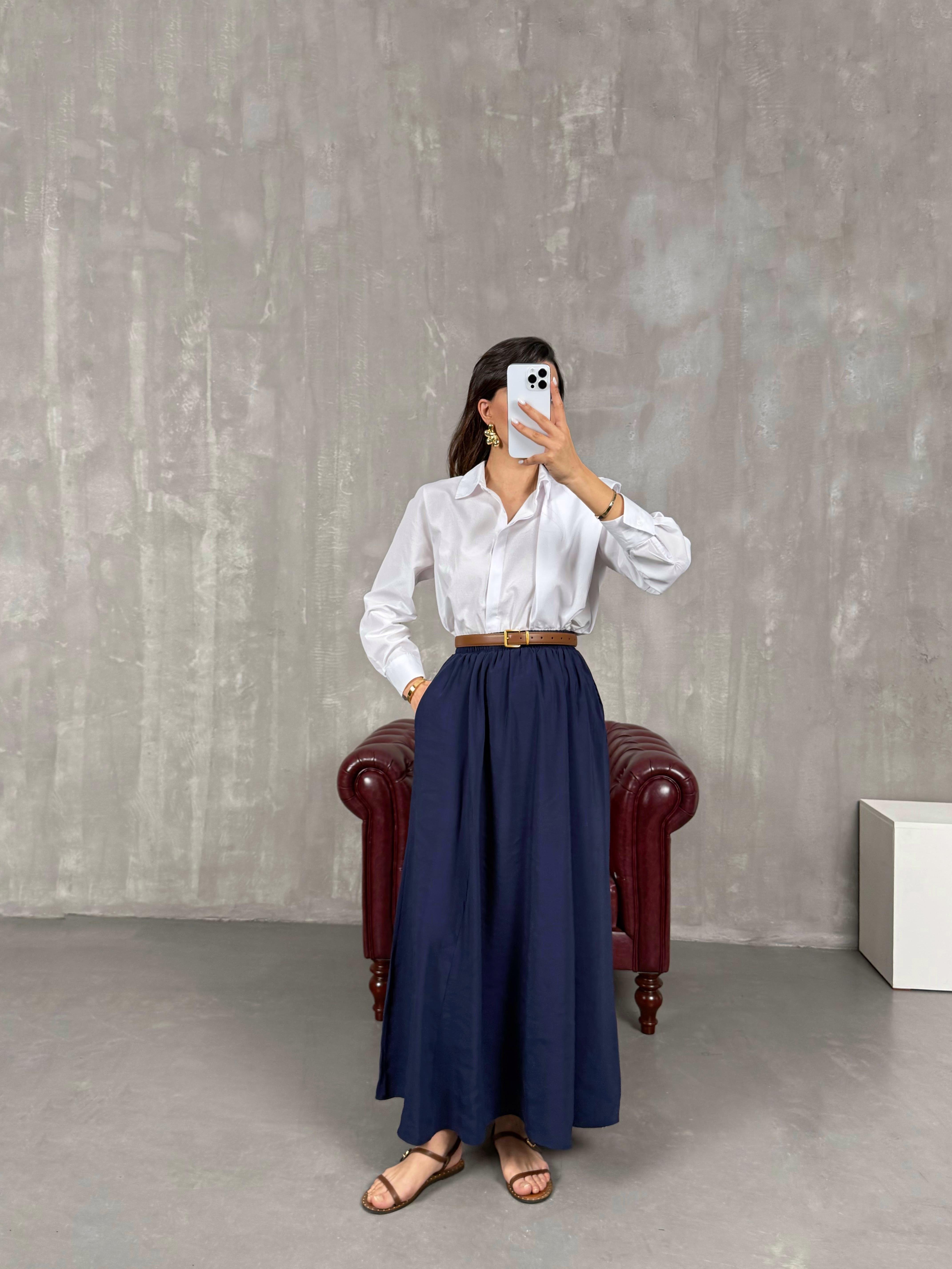 تنورة قماش تينسيل لون كحلي مع جيب Gaus00035