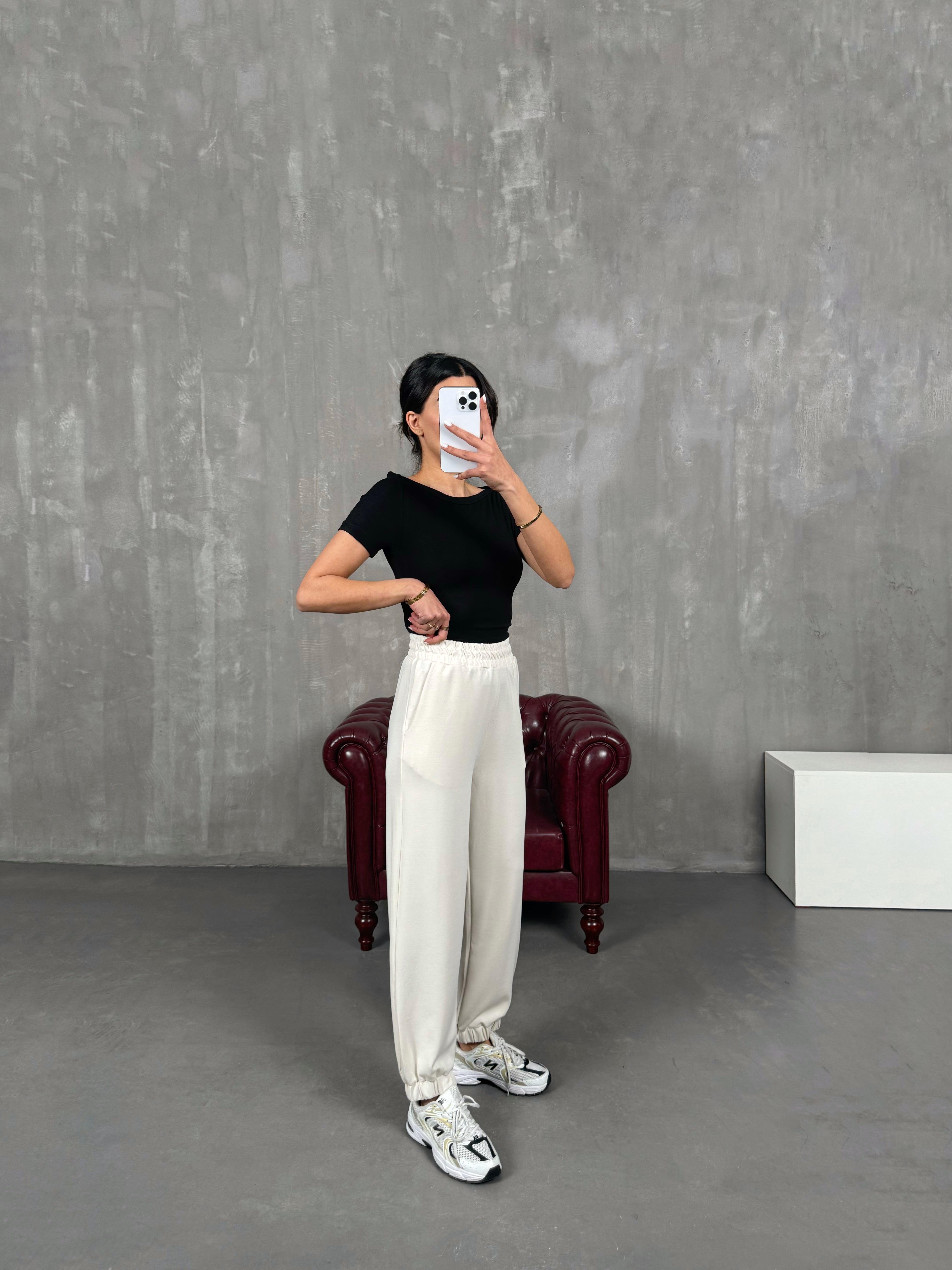 إيسولده بنطلون لون إكرو قماش مودال بريميوم بساق مطاطية