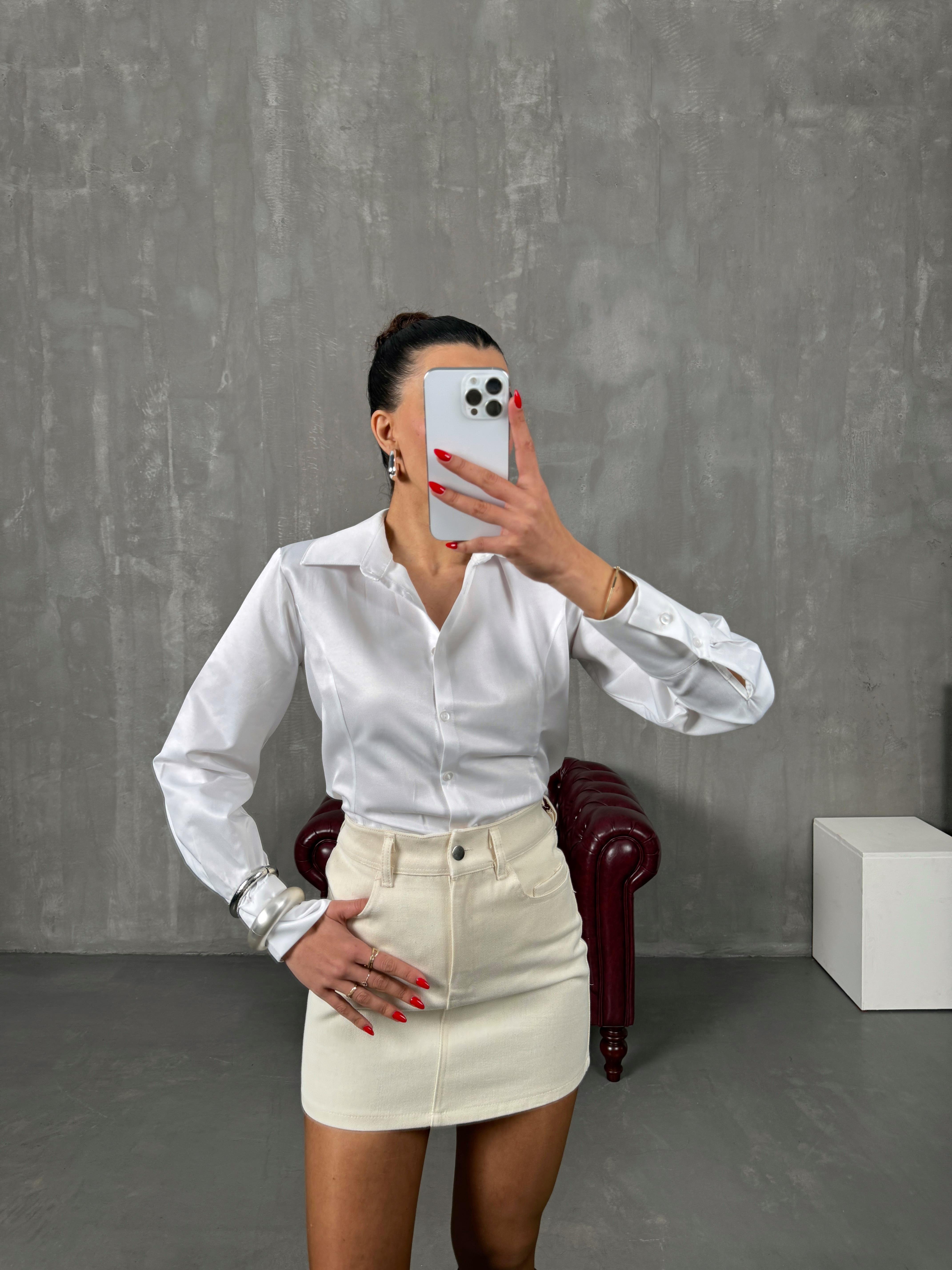 هابل تنورة لون إكرو قماش جبردين 