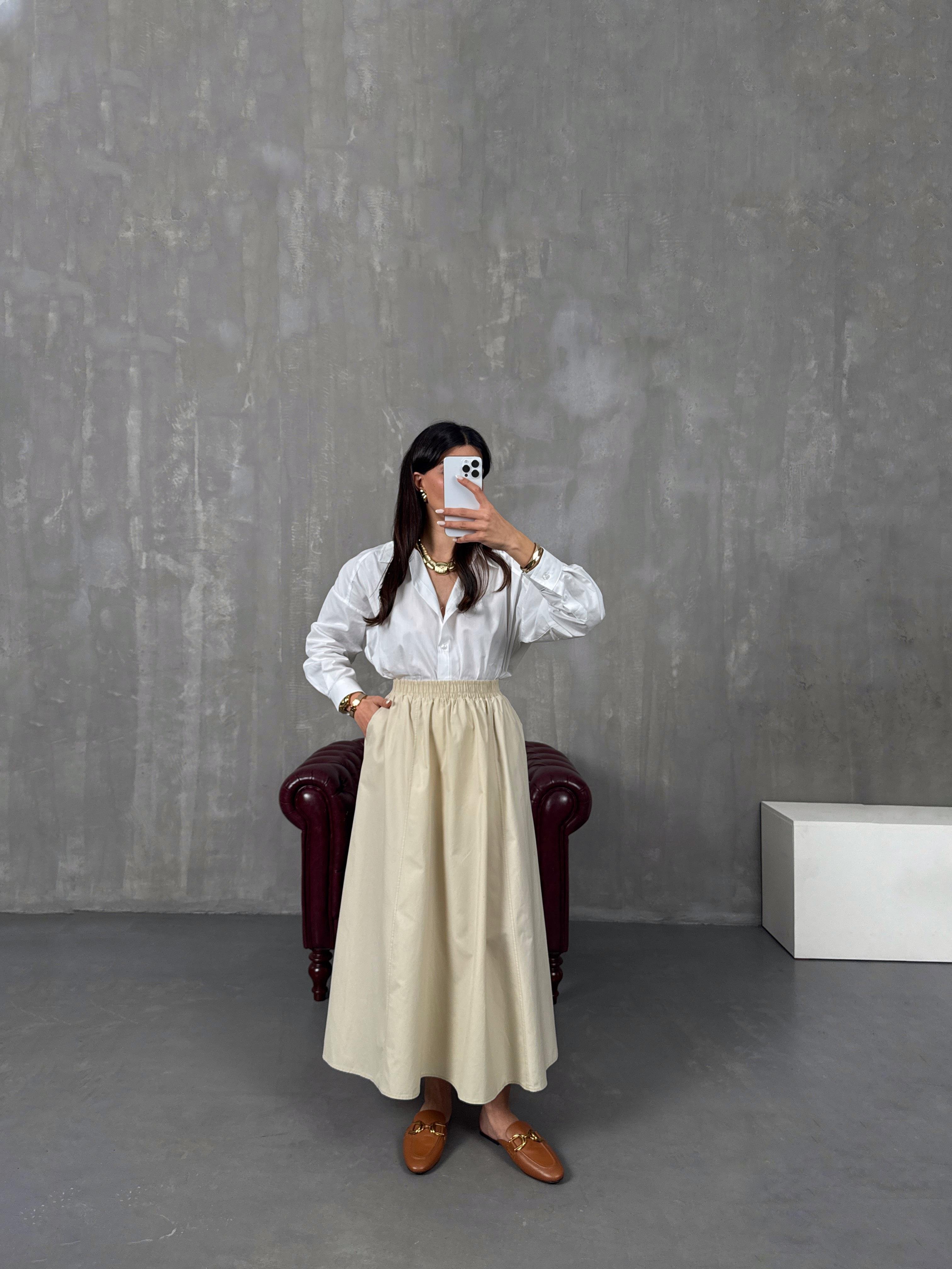 جرايس تنورة قماش بوبلين كريمي