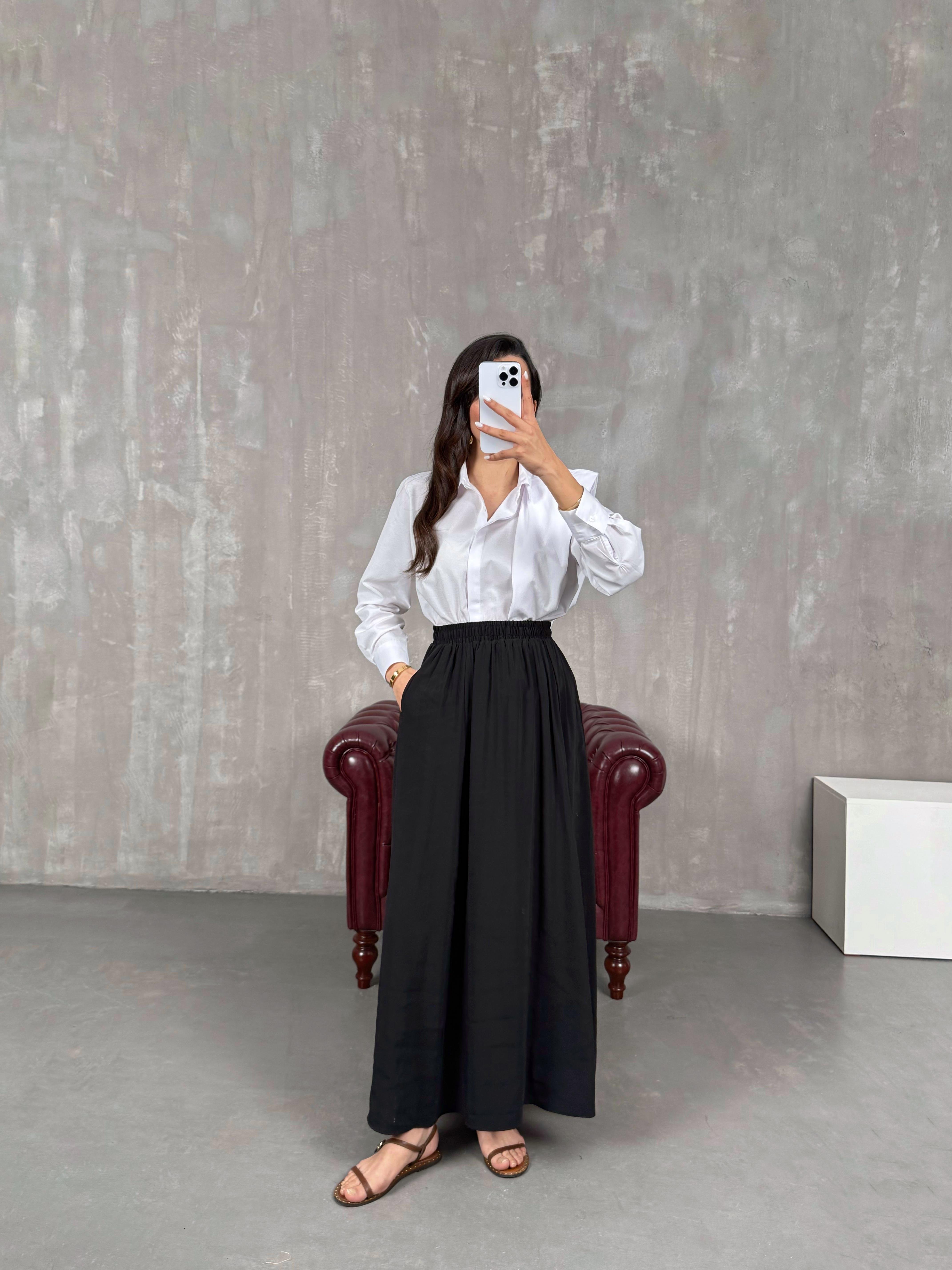 تنورة قماش تينسيل لون أسود مع جيب Gaus00035