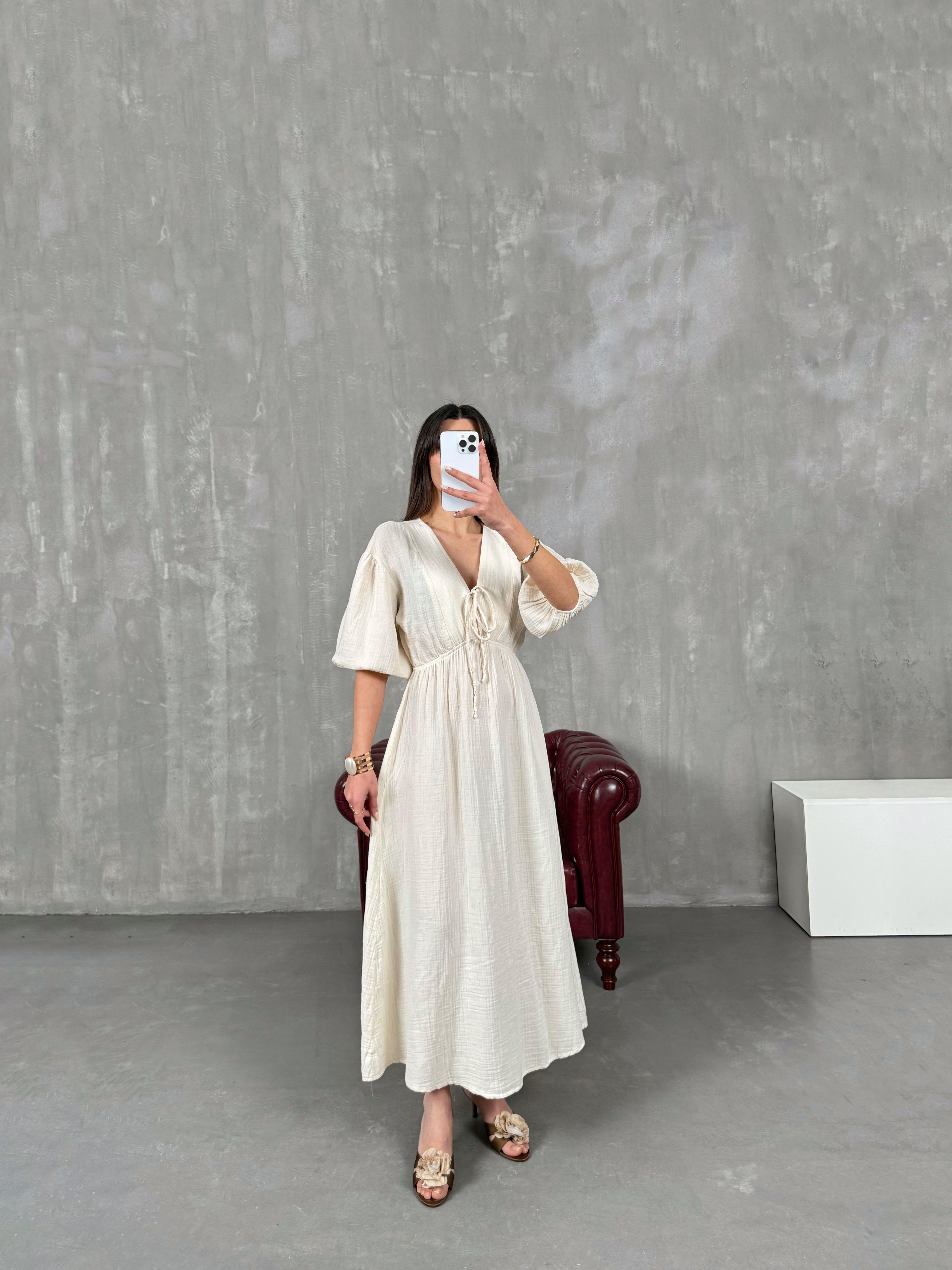 جسيكا فستان لون حجري قماش موسلين بياقة شكل V وخصر مطاطي