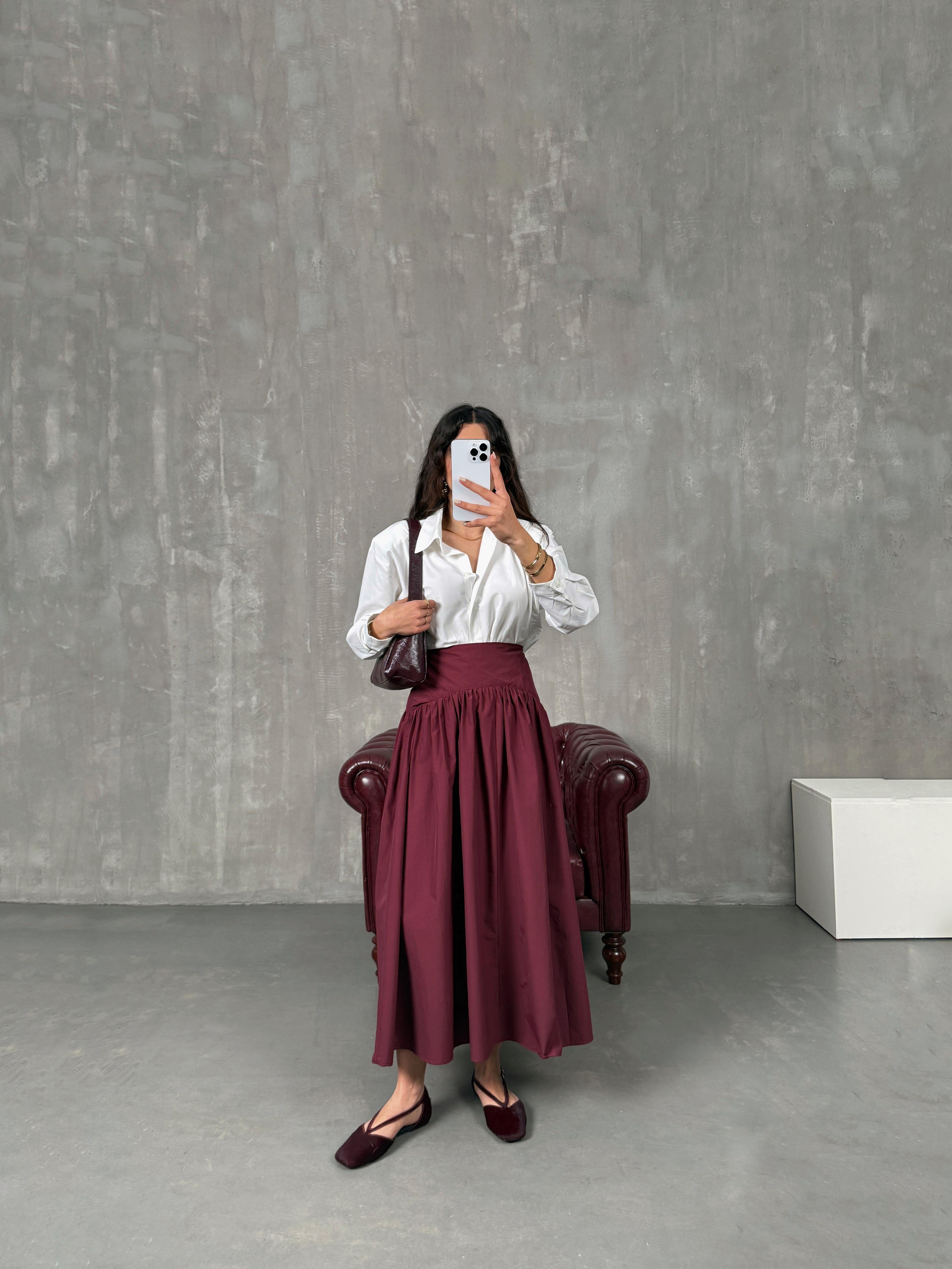 فاسكو تنورة لون بوردر قماش بوبلين بتفاصيل خصر مُعادل لماسّي