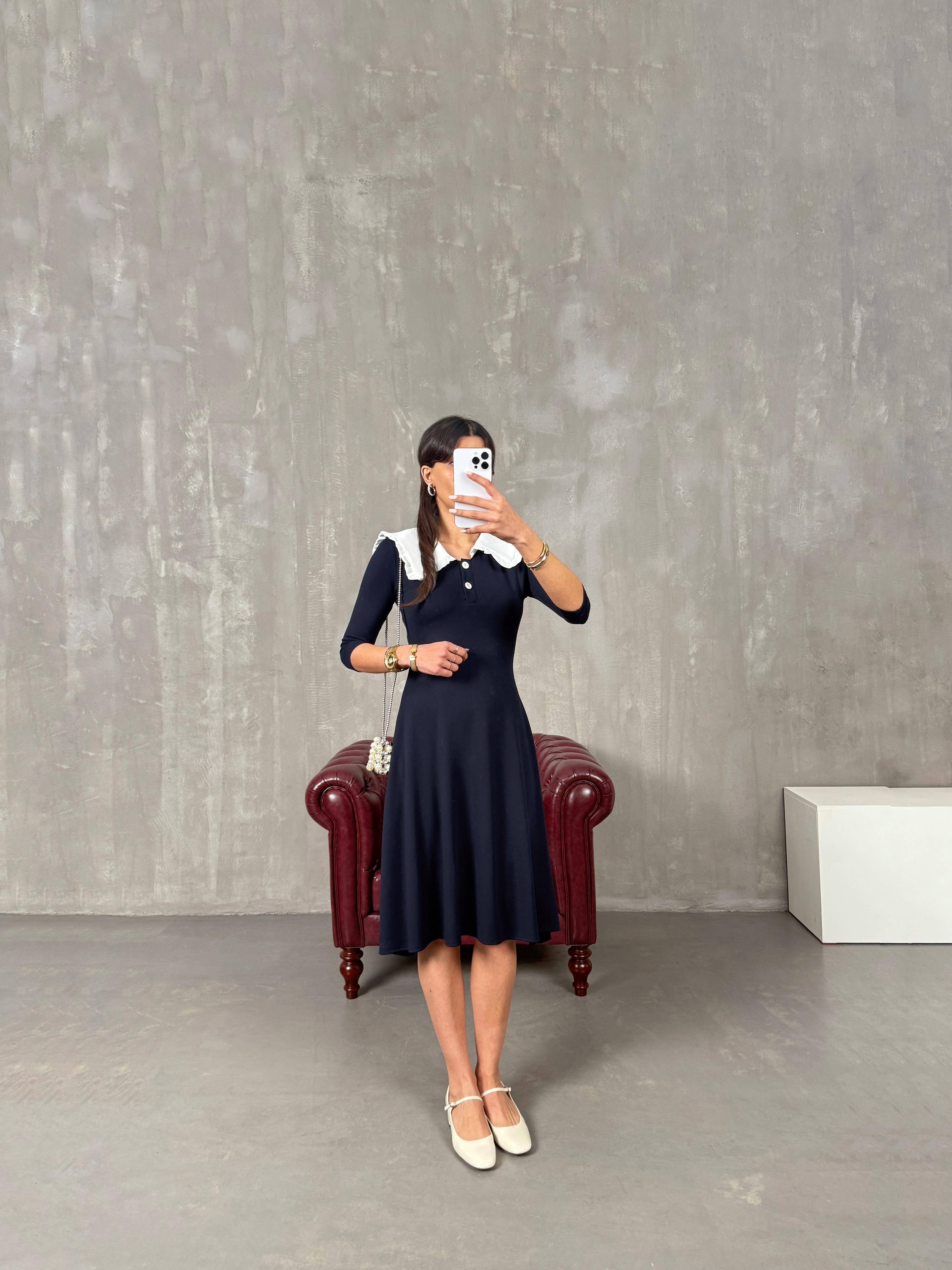 بريس ‎فستان كحلي بياقة بيبي