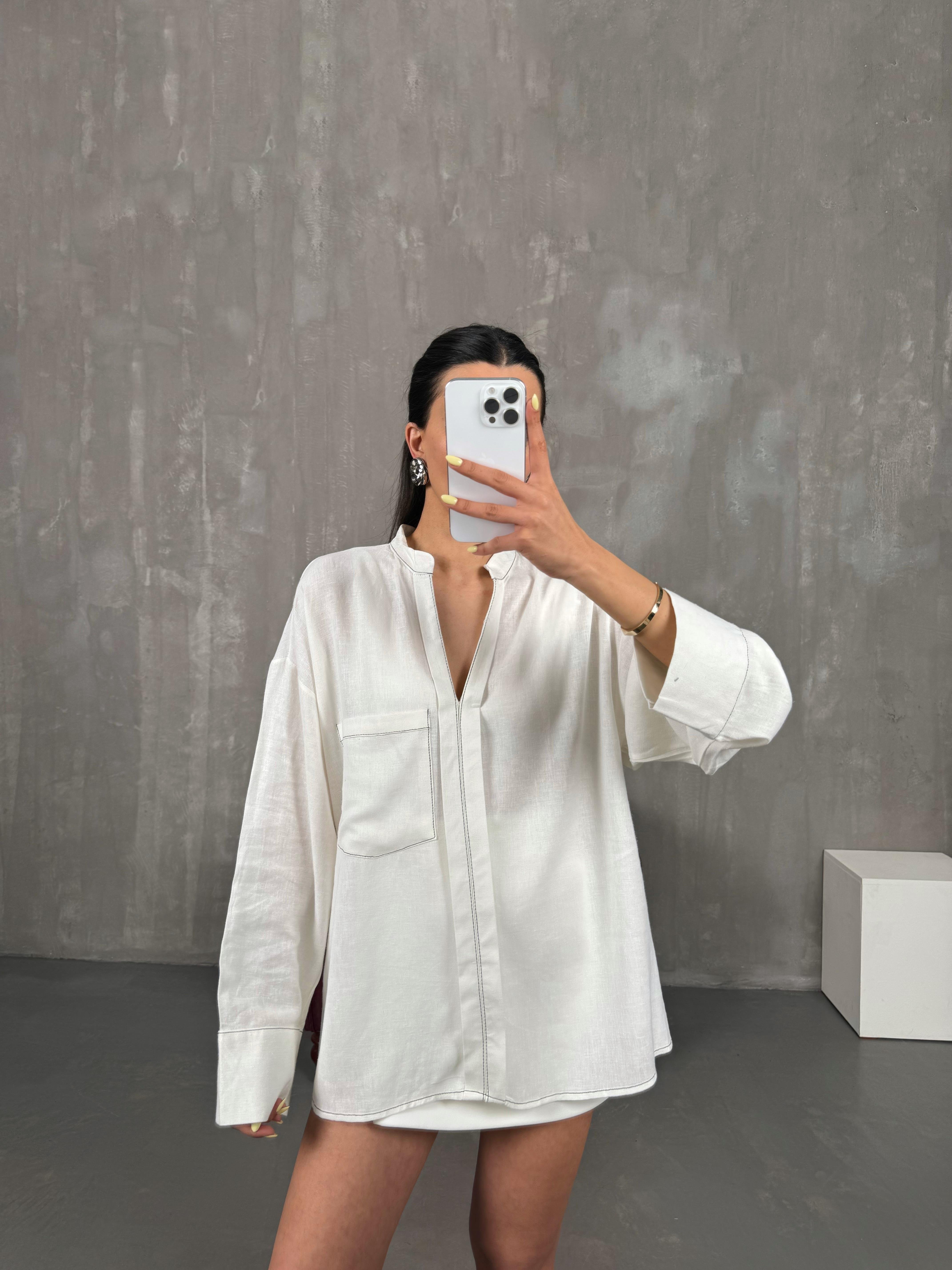 قميص كتان لون كريمي بتفاصيل تطريز أسود وياقة شكل V Gaus00105