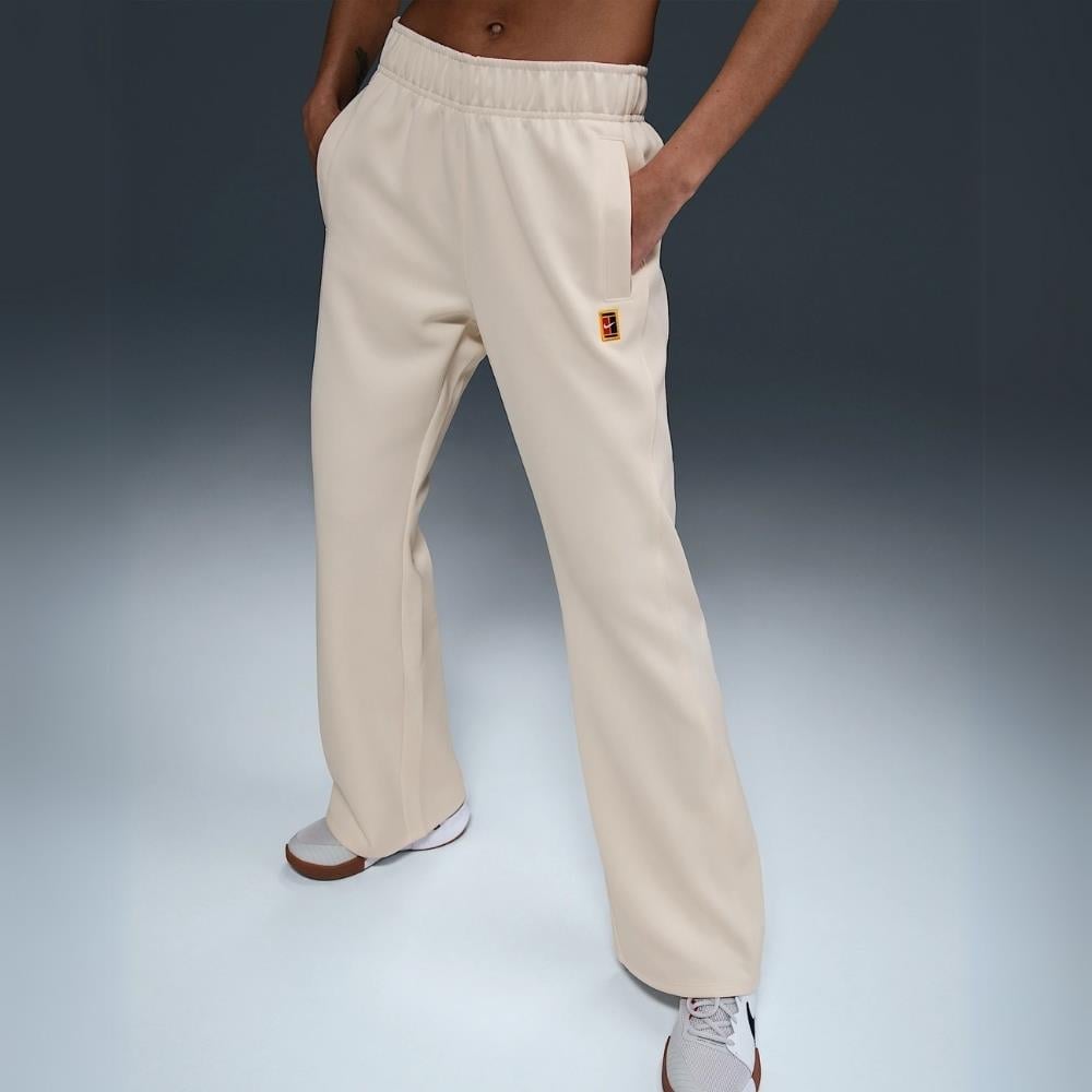 NikeCourt Heritage Windrunner Normal Belli Tenis Eşofman Altı - Krem