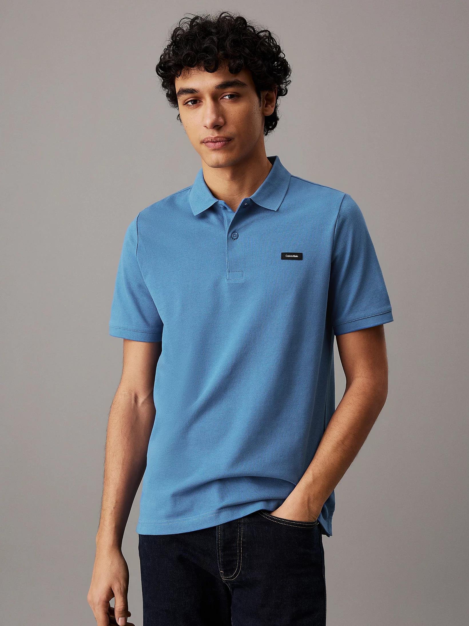 Calvin Klein Calvin Klein Erkek Marka Logolu Polo Yakalı Organik Pamuklu Açık Mavi Polo Yaka T-Shirt K10K111196-CE4