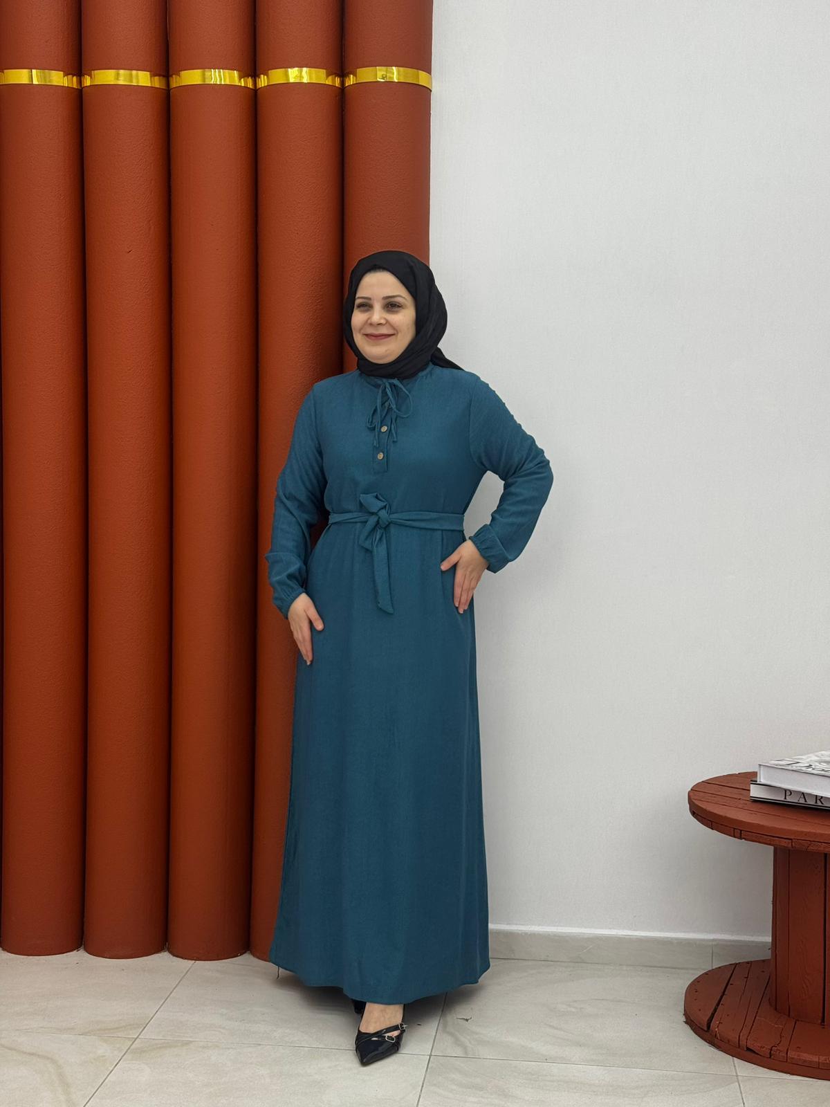 9665 karin kumaş yarım dügmeli mavi