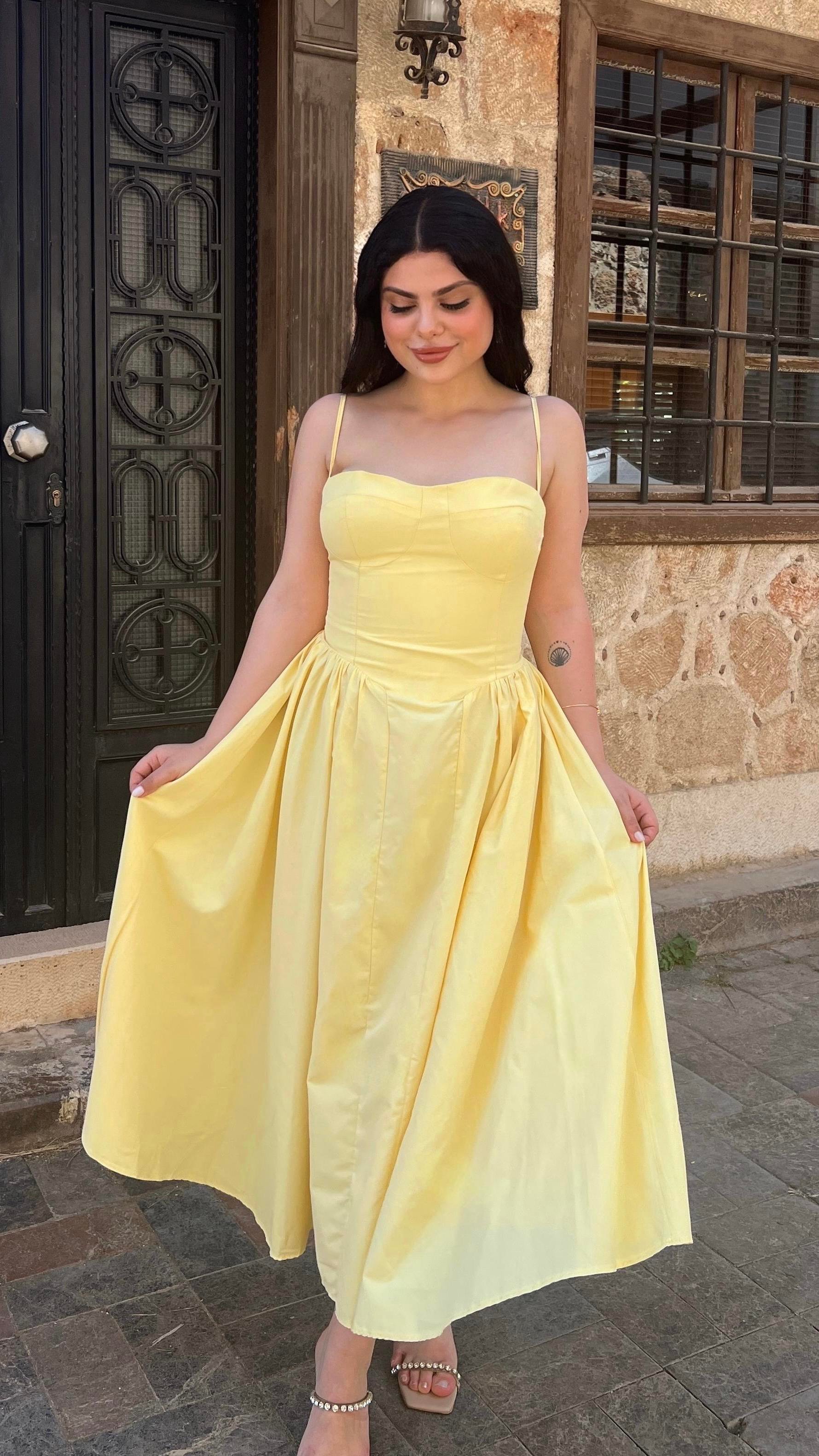 ASKILI GÖĞÜS KUPLU SARI ELBİSE