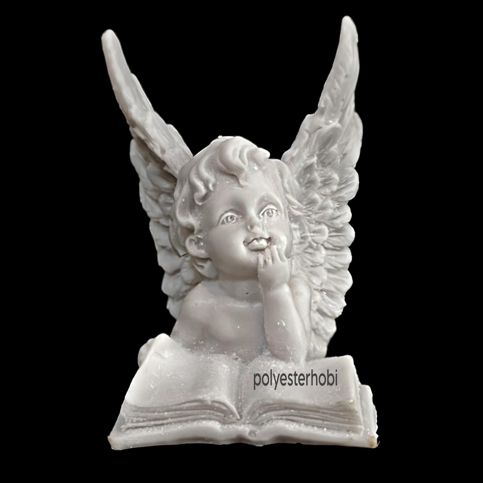 ob-1997-melek-kitap-okuyan-ham-polyest-3-6cbc.jpg