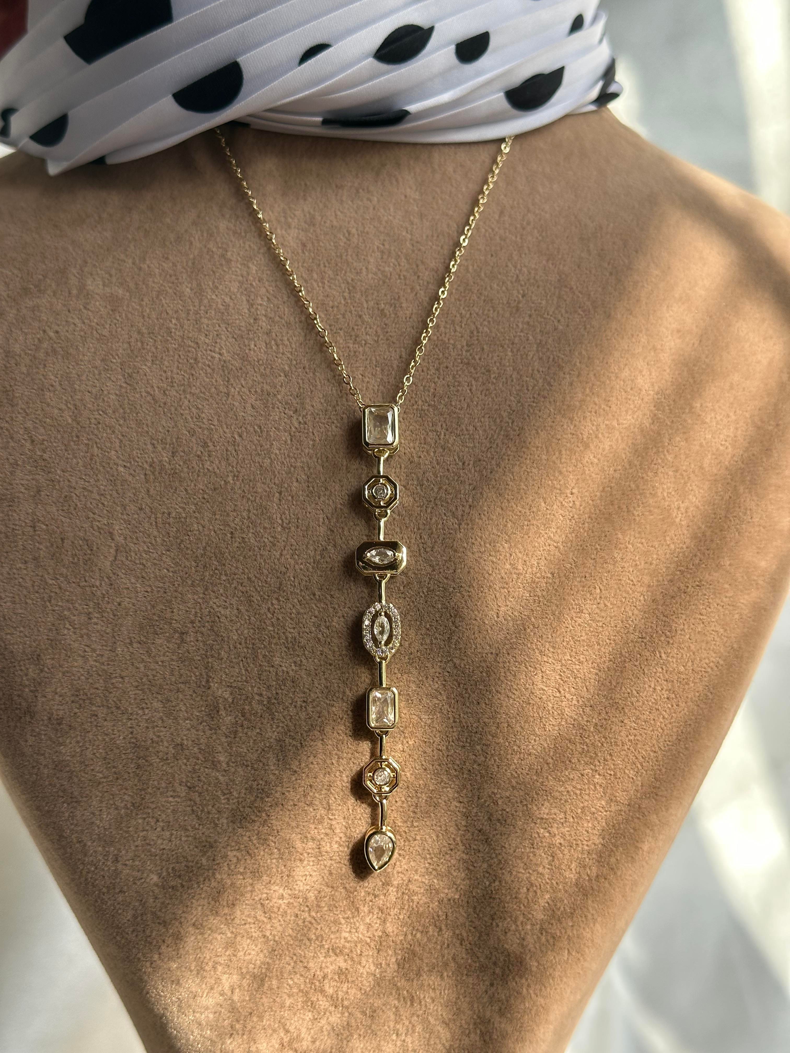 Zirkon & Baget Taş 7 Element Çelik Kolye Gold