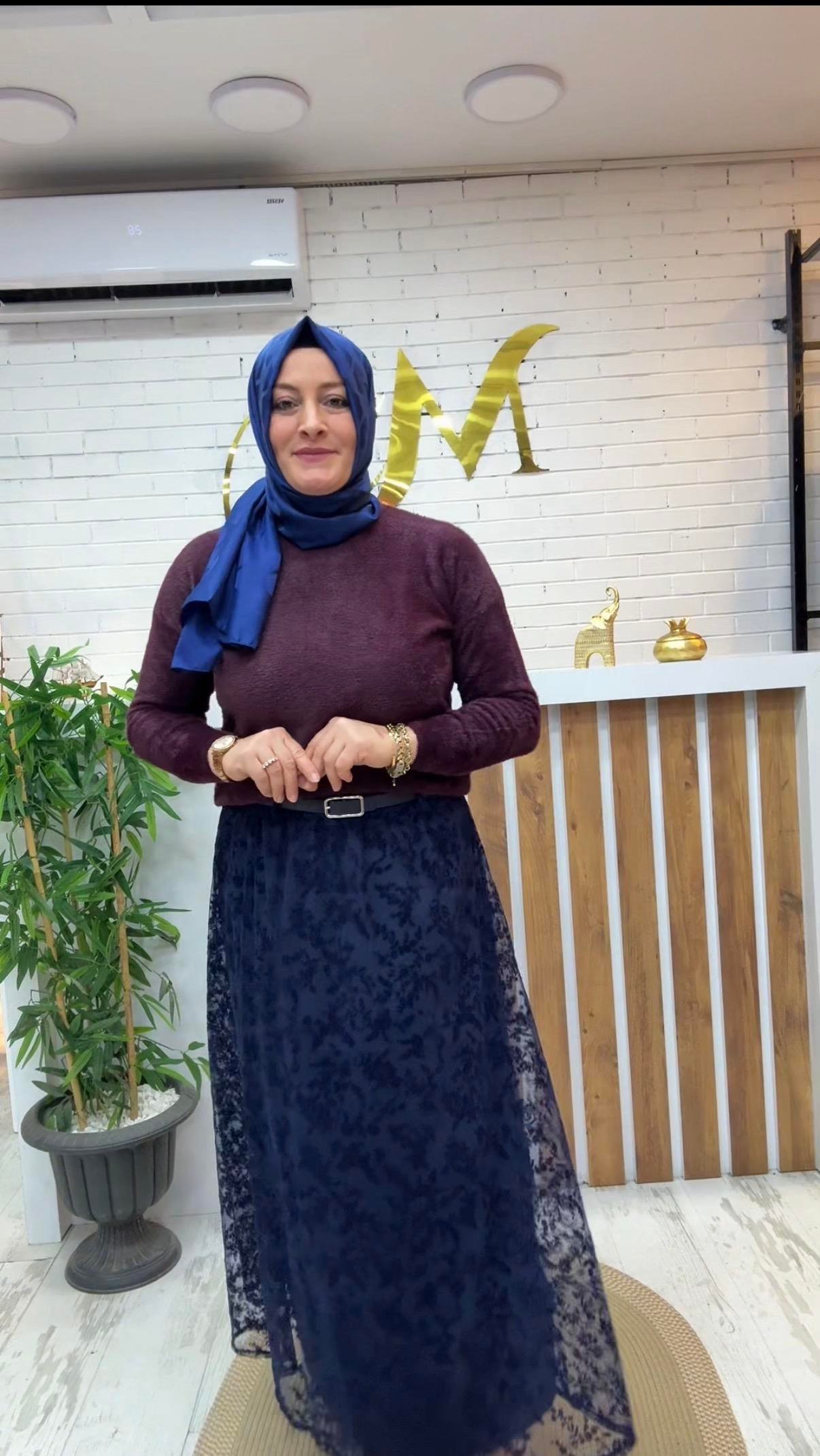 ETEK ÜSTÜ YUMOŞ KAZAK