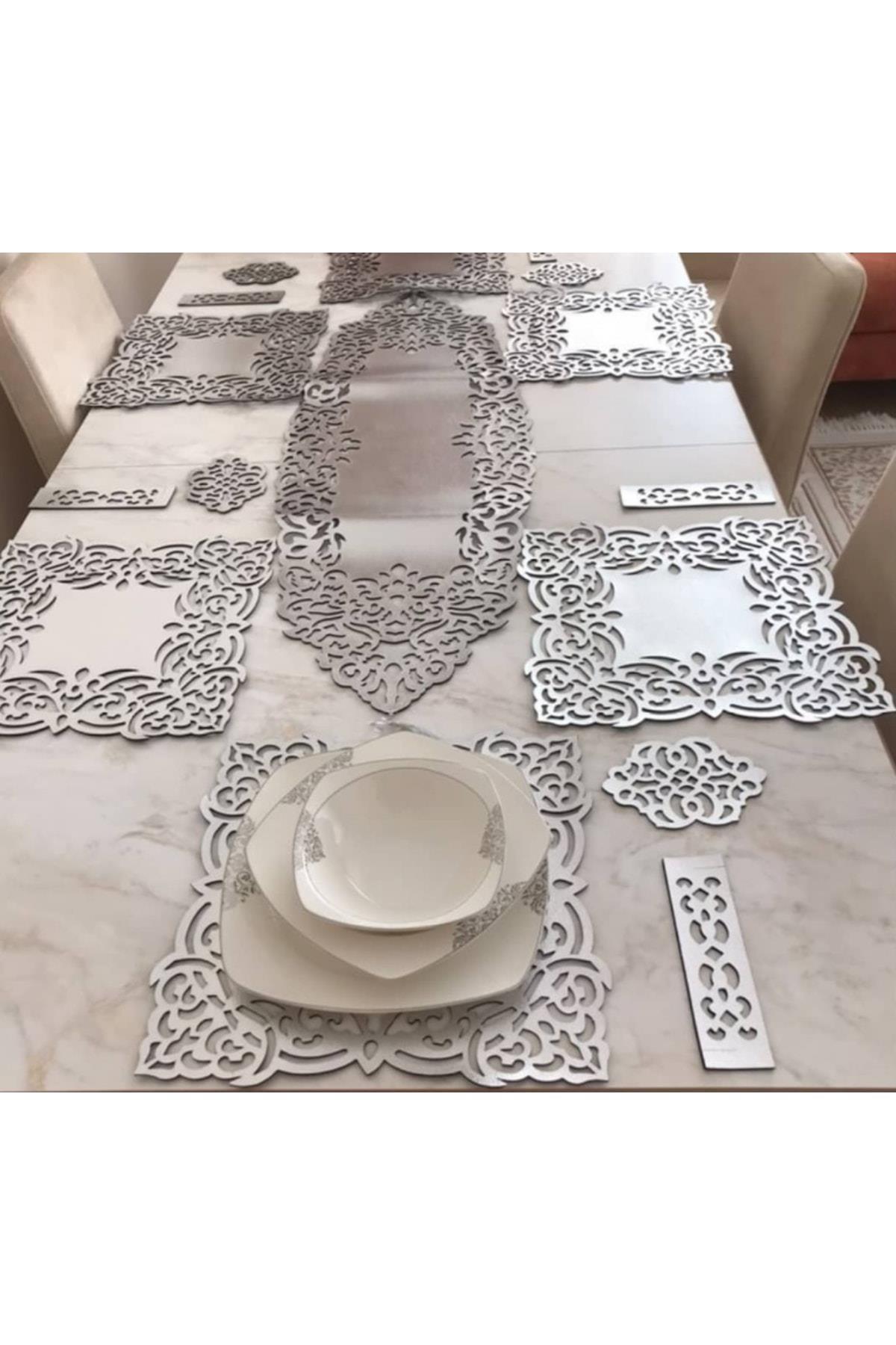 1 Runner(100X33CM), 6 Servis(33X33CM), 6 B.altlığı, 6 Kaşıklık/toplam 19 Parça/suni Deri