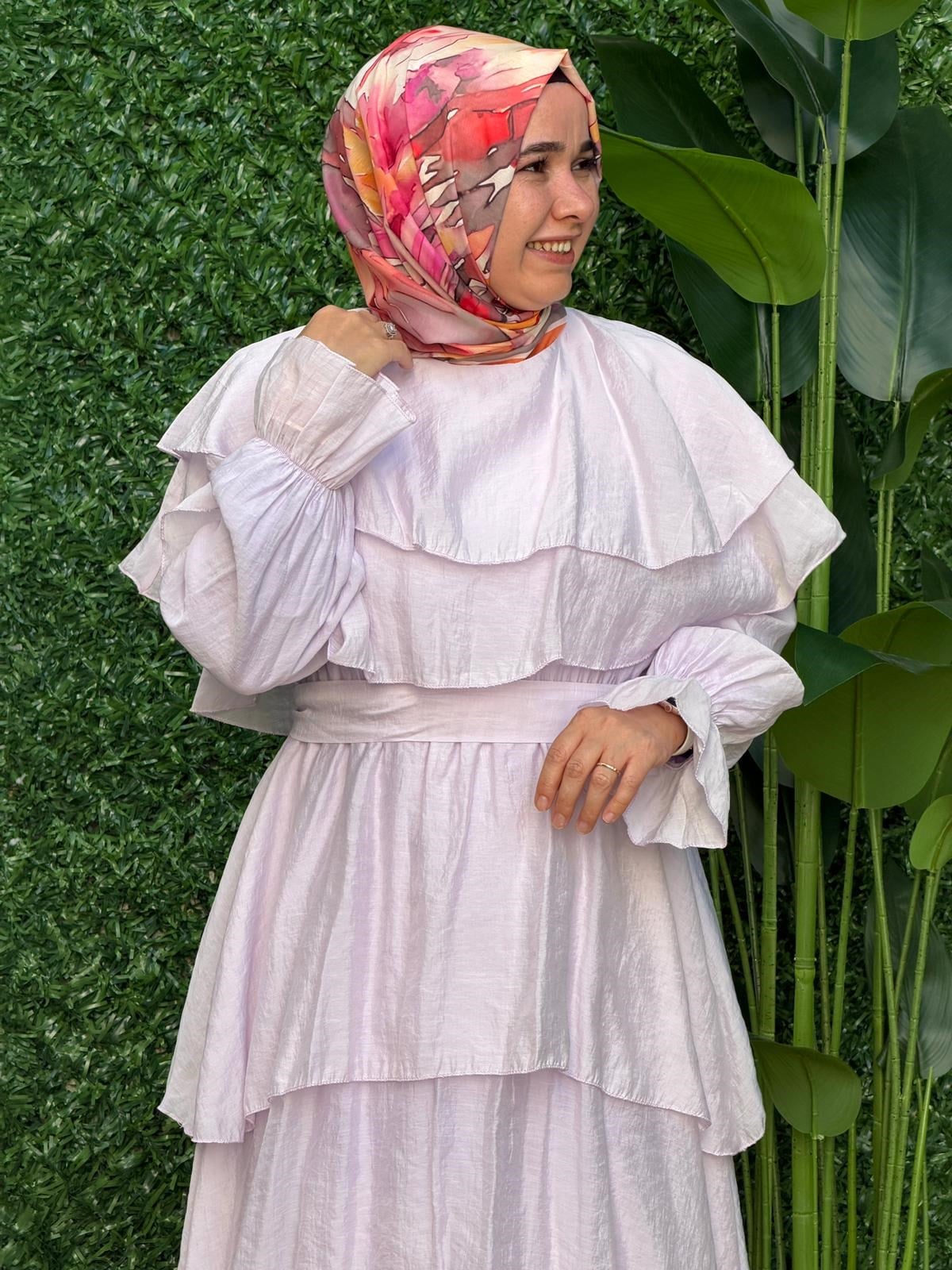 Lila Elbise