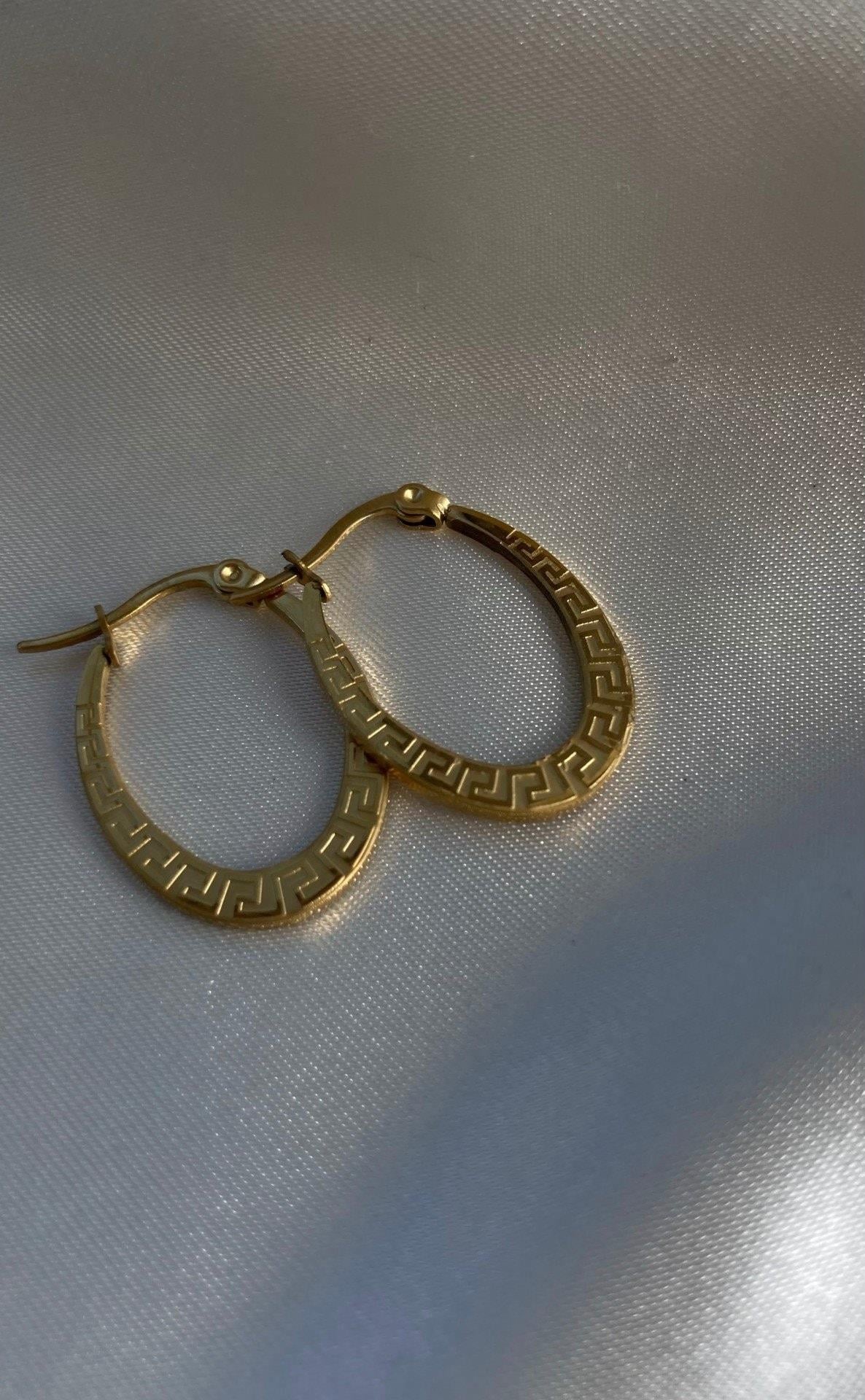 Desenli oval kuyumcu model küpe