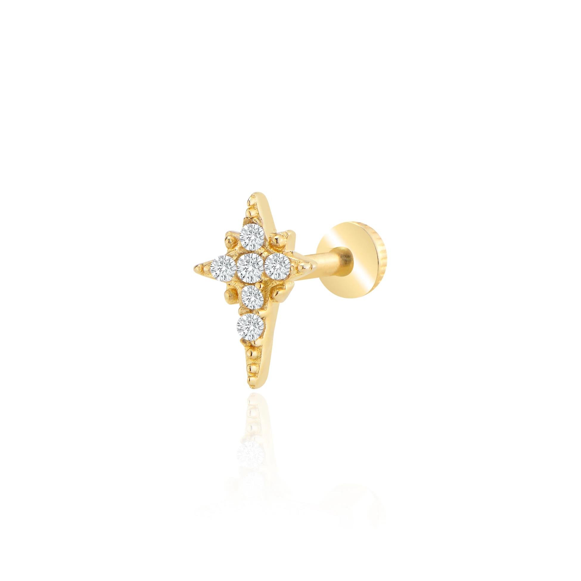 Kutup yıldızı tragus piercing