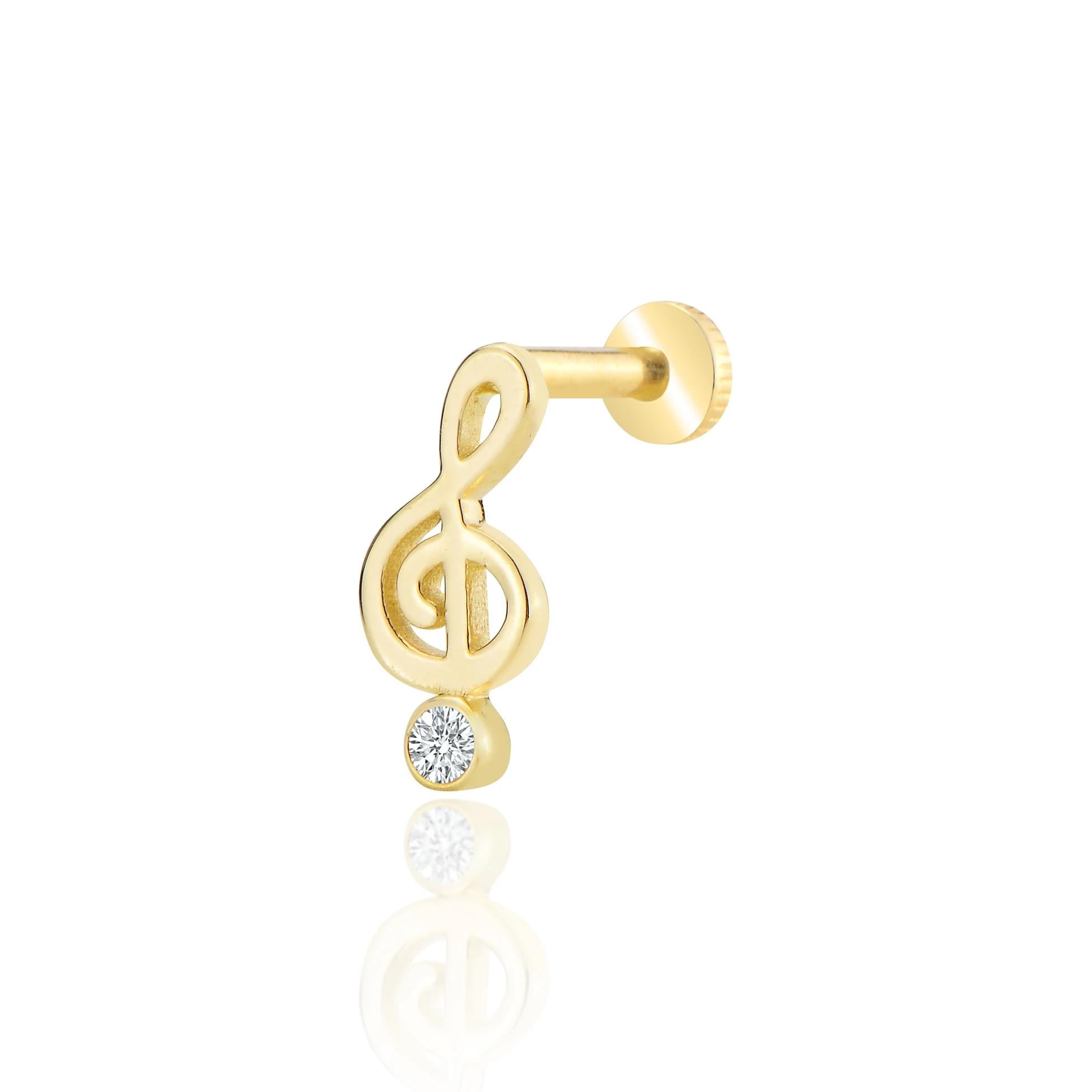 Sol anahtarı tragus piercing