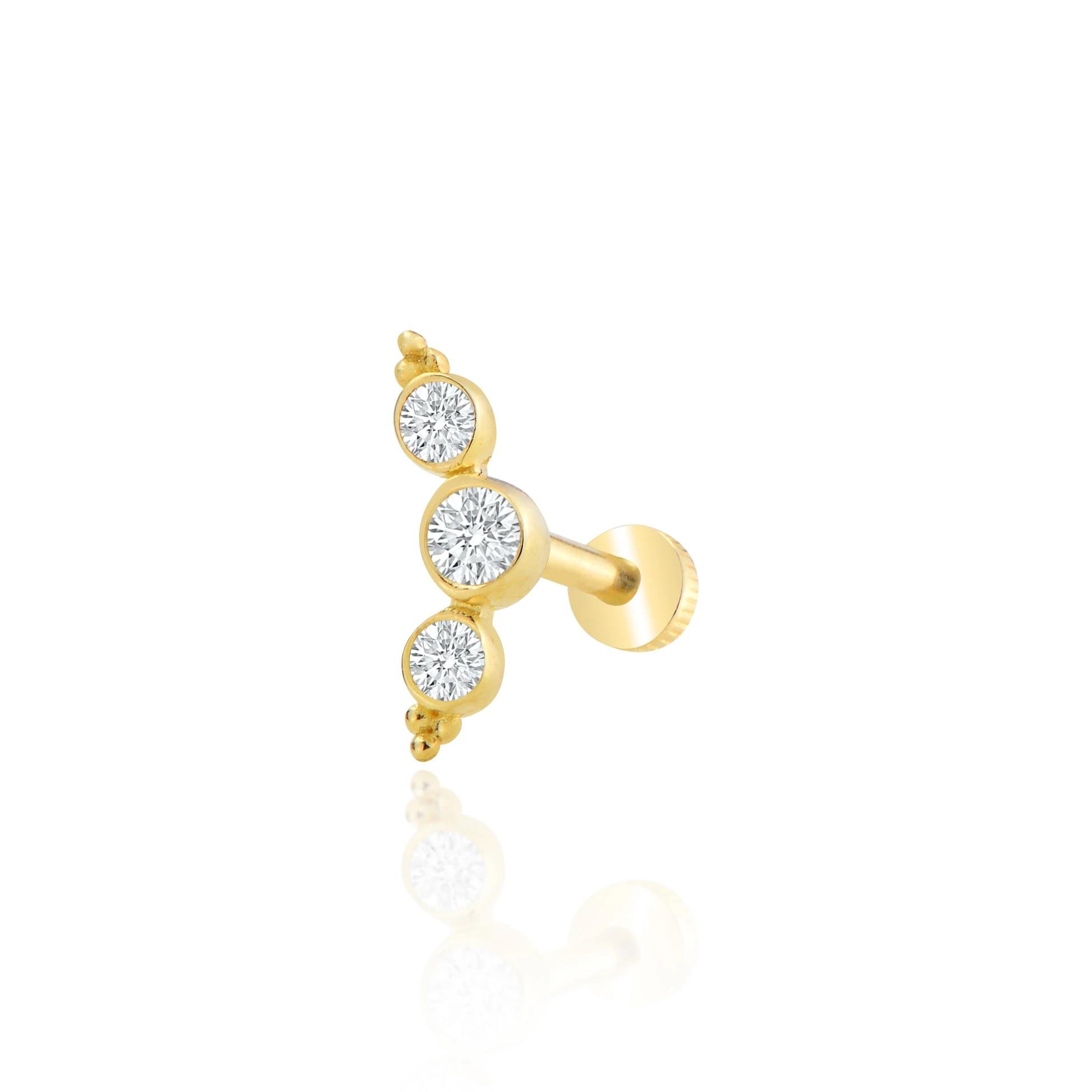 Tria sıralı tragus piercing