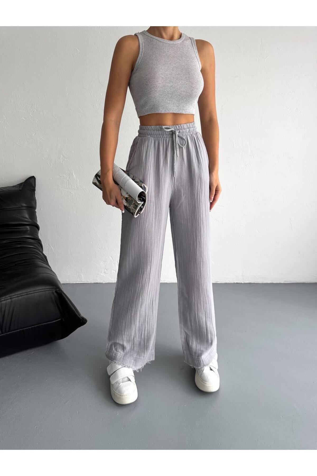 muslin-kumas-paca-puskul-detay-pantolo-5705eb.jpg