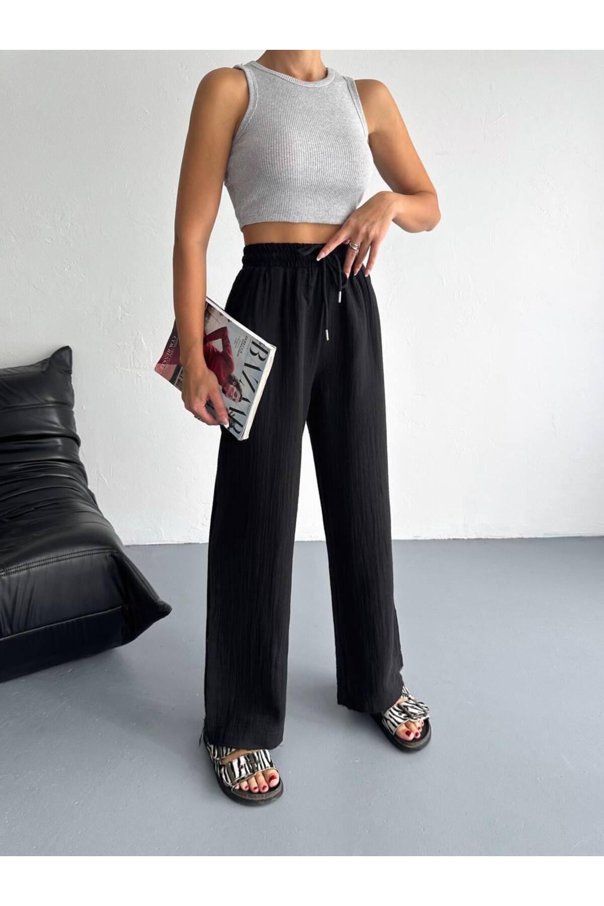 muslin-kumas-paca-puskul-detay-pantolo-82-a62.jpg