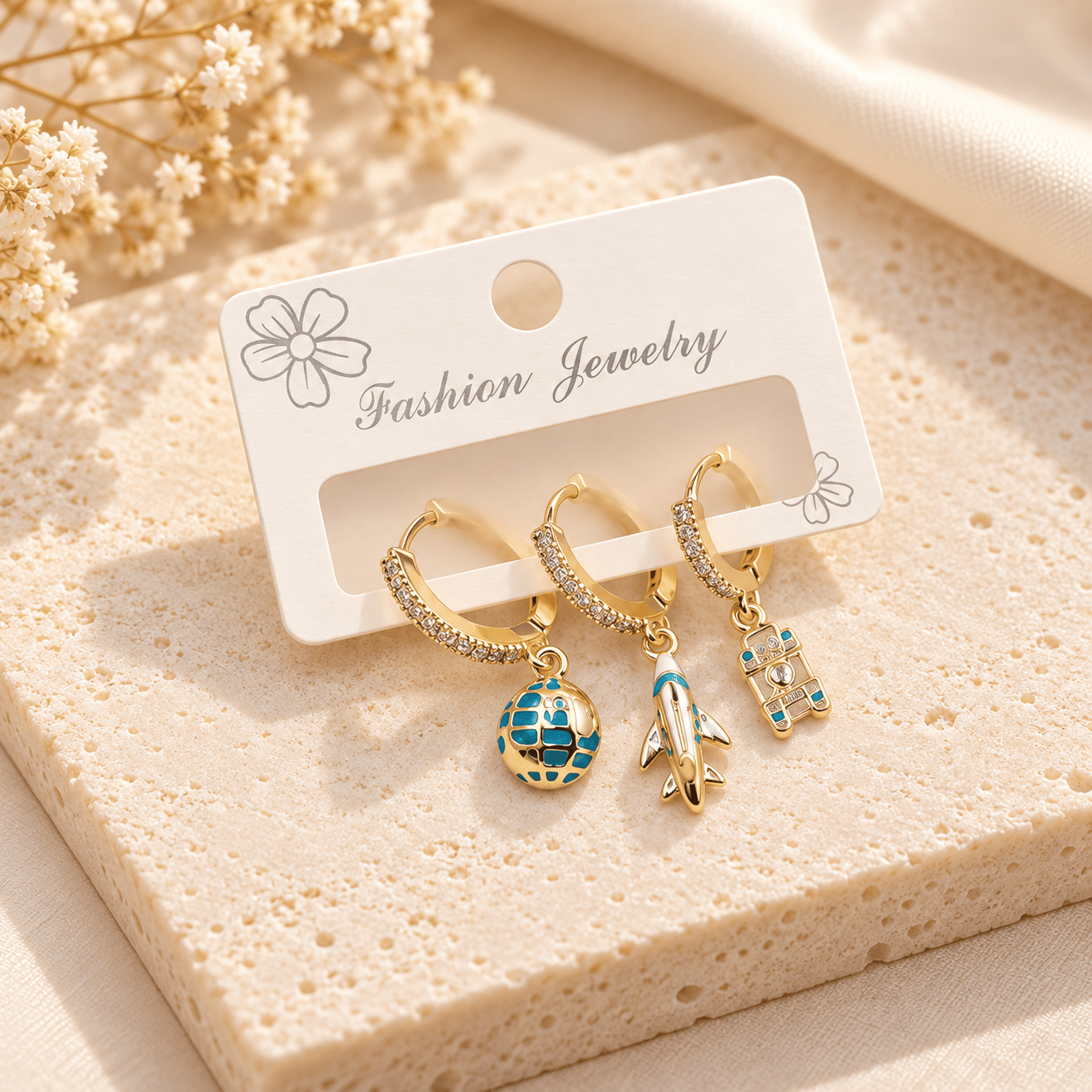 3'lü seyahat figürlü çelik küpe 