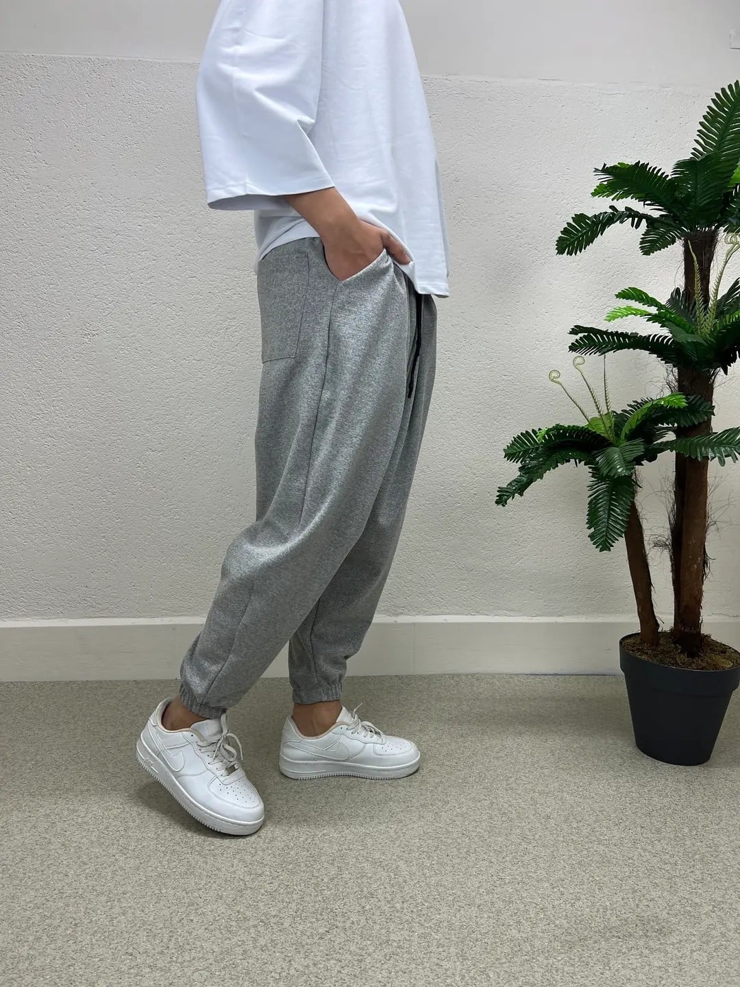 Erkek Açık Gri Beli ve Paçası Lastikli Bol Kesim Cepli Jogger Eşofman Altı HZL24S-MXC8989-211