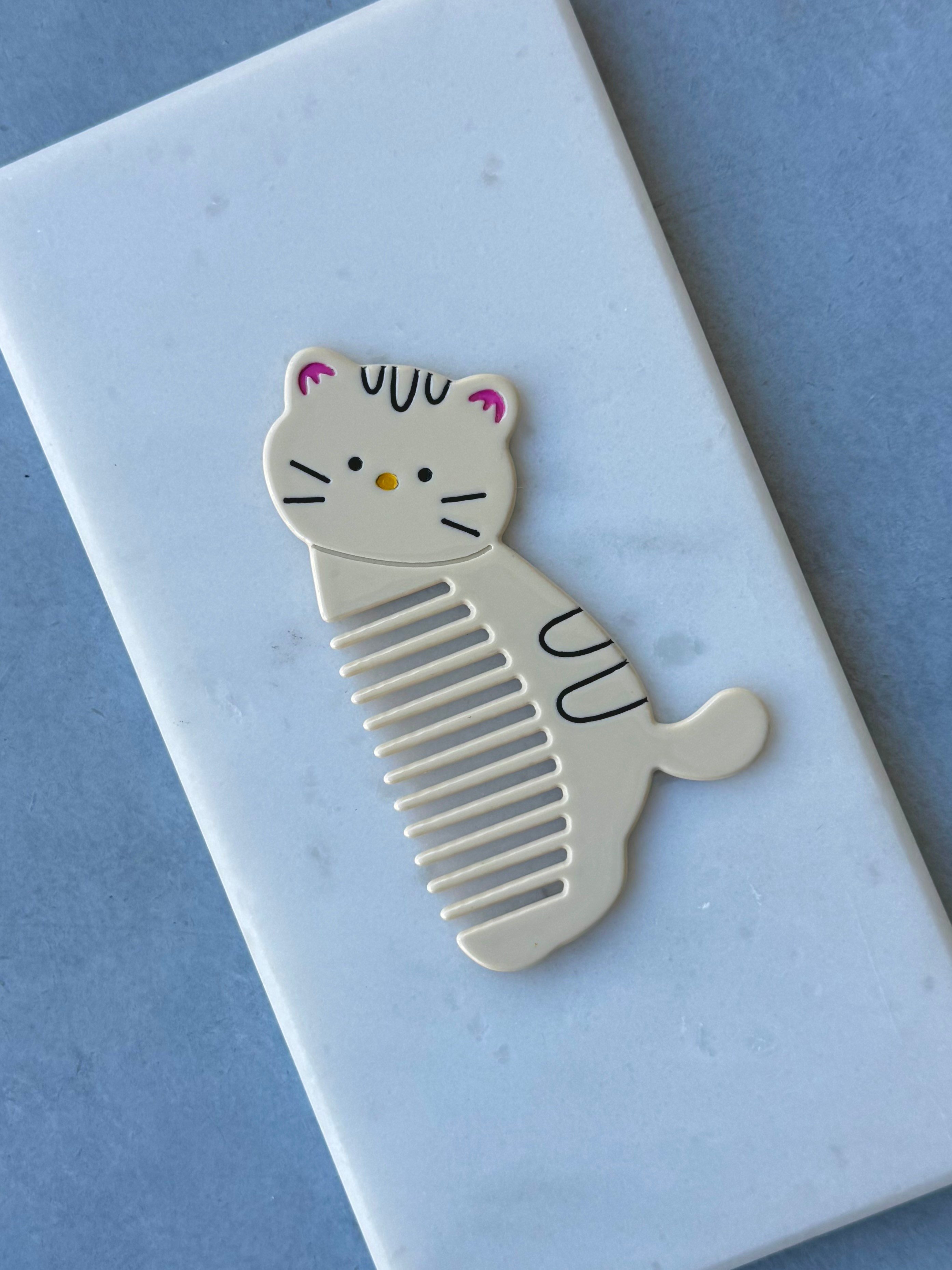 Krem Kedi Kemik Tarak