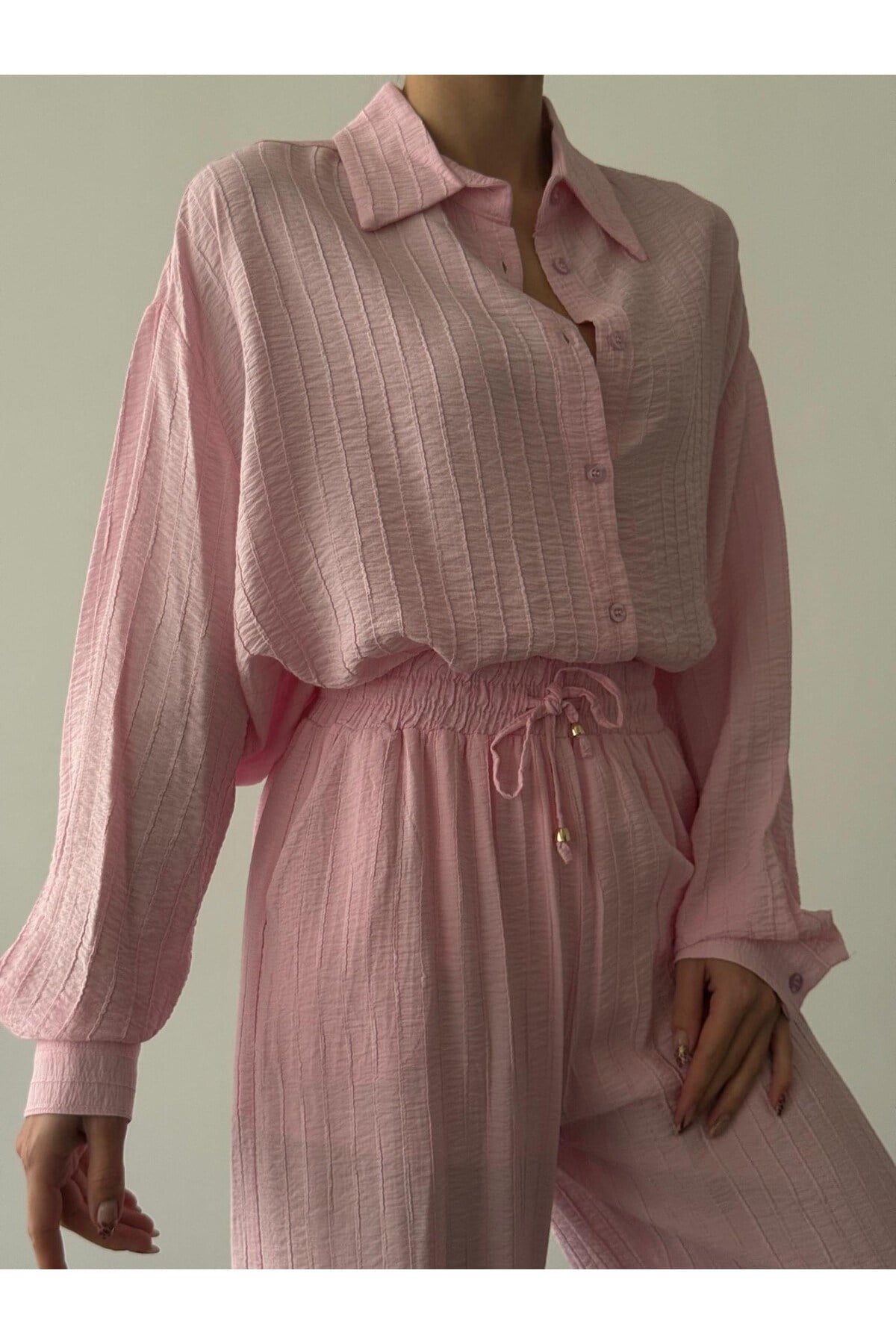 kadin-cizgili-gomlek-4cb9cb.jpg