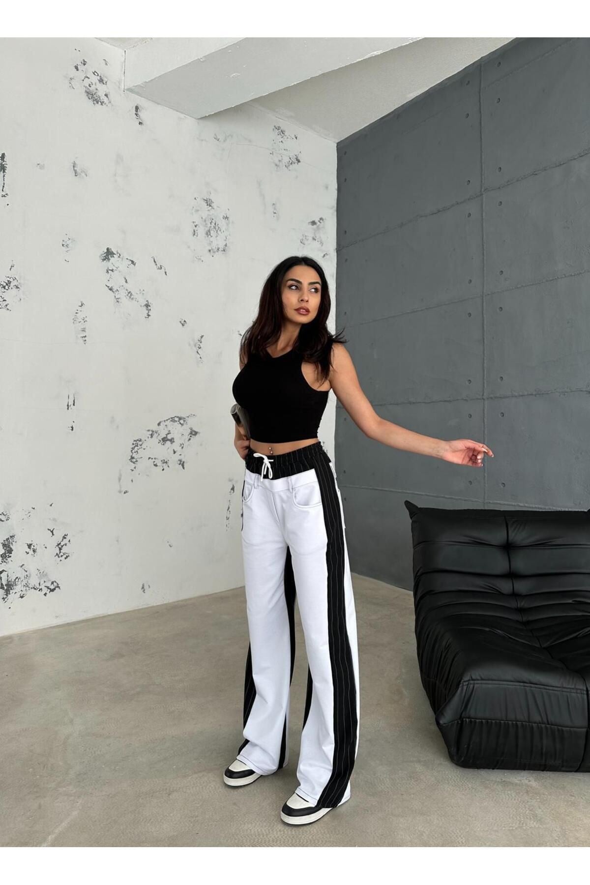 BEYAZ BAGGY PANTOLON YANLARI SİYAH DETAY ŞERİTLİ BELİ LASTİKLİ