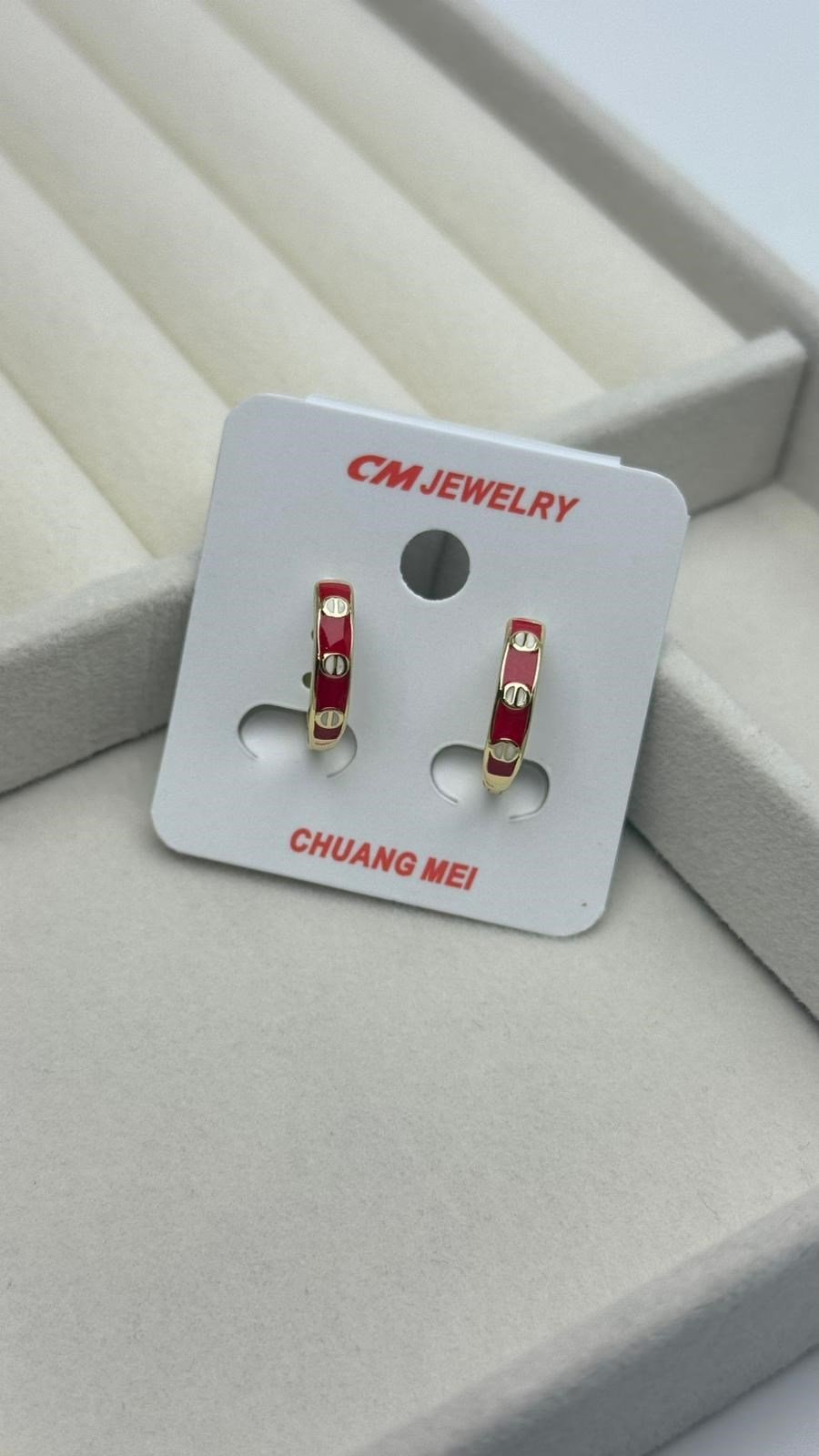 CM Küpe