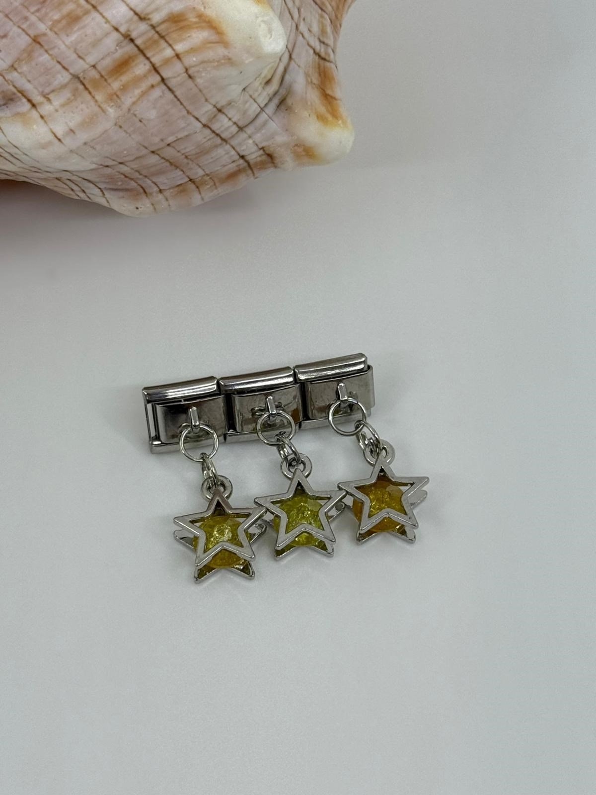 Nomi charm