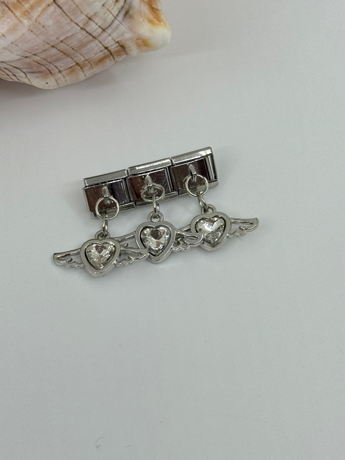 Nomi  Charm