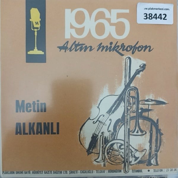 metin-alkanli-1965-altin-mikrofon-kara-e46-04.jpg