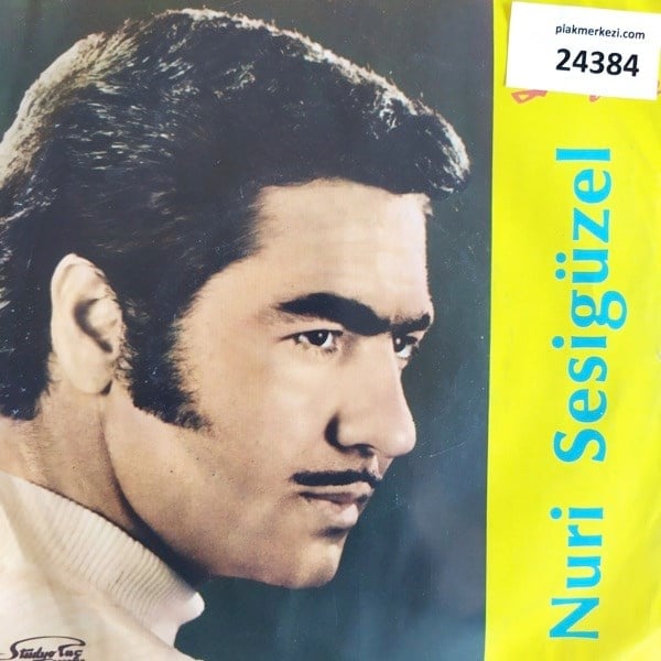 nuri-sesiguzel-sen-olmasan-yuzum-gulme-43e1-a.jpg