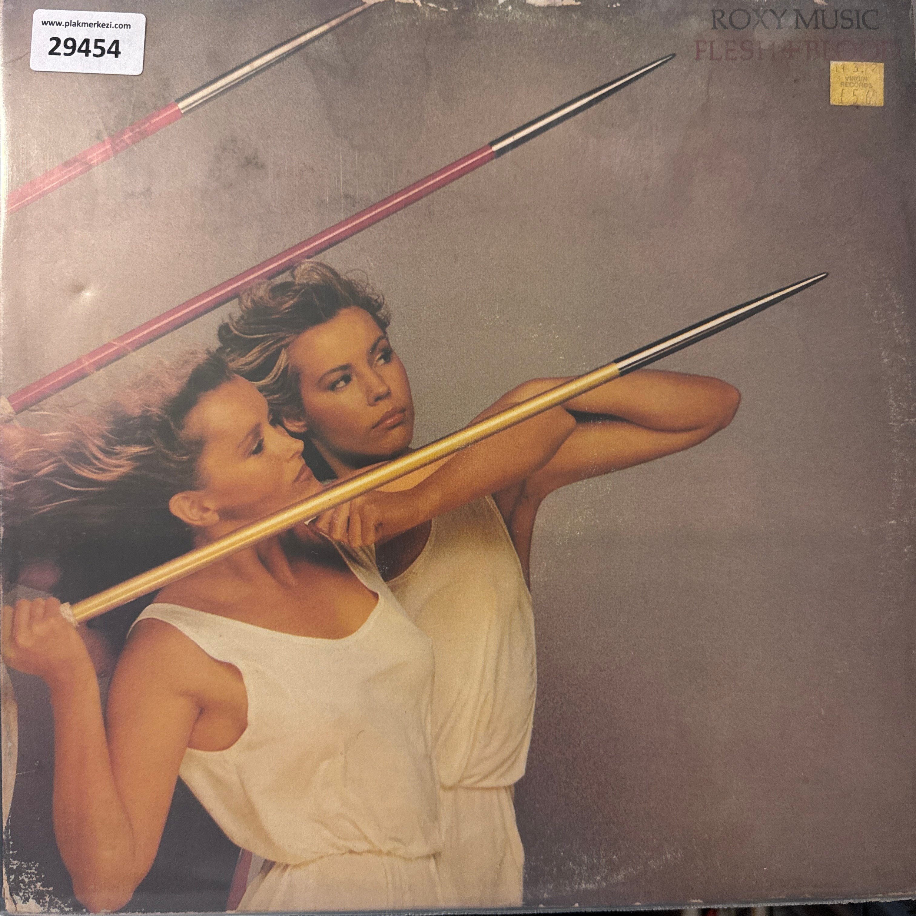 roxy-music-flesh-blood-acilir-kapak-19-3fb1ae.jpg