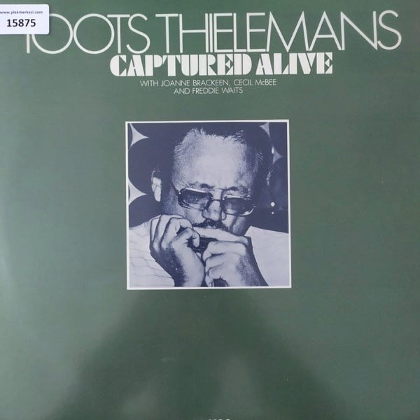 toots-thielemans-captured-alive-insert-684a4e.jpg