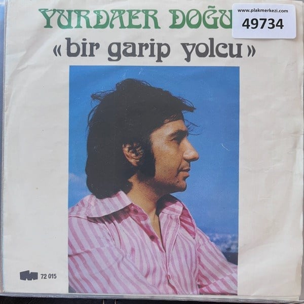 yurdaer-dogulu-bir-garip-yolcu-agora-m-ce0094.jpg