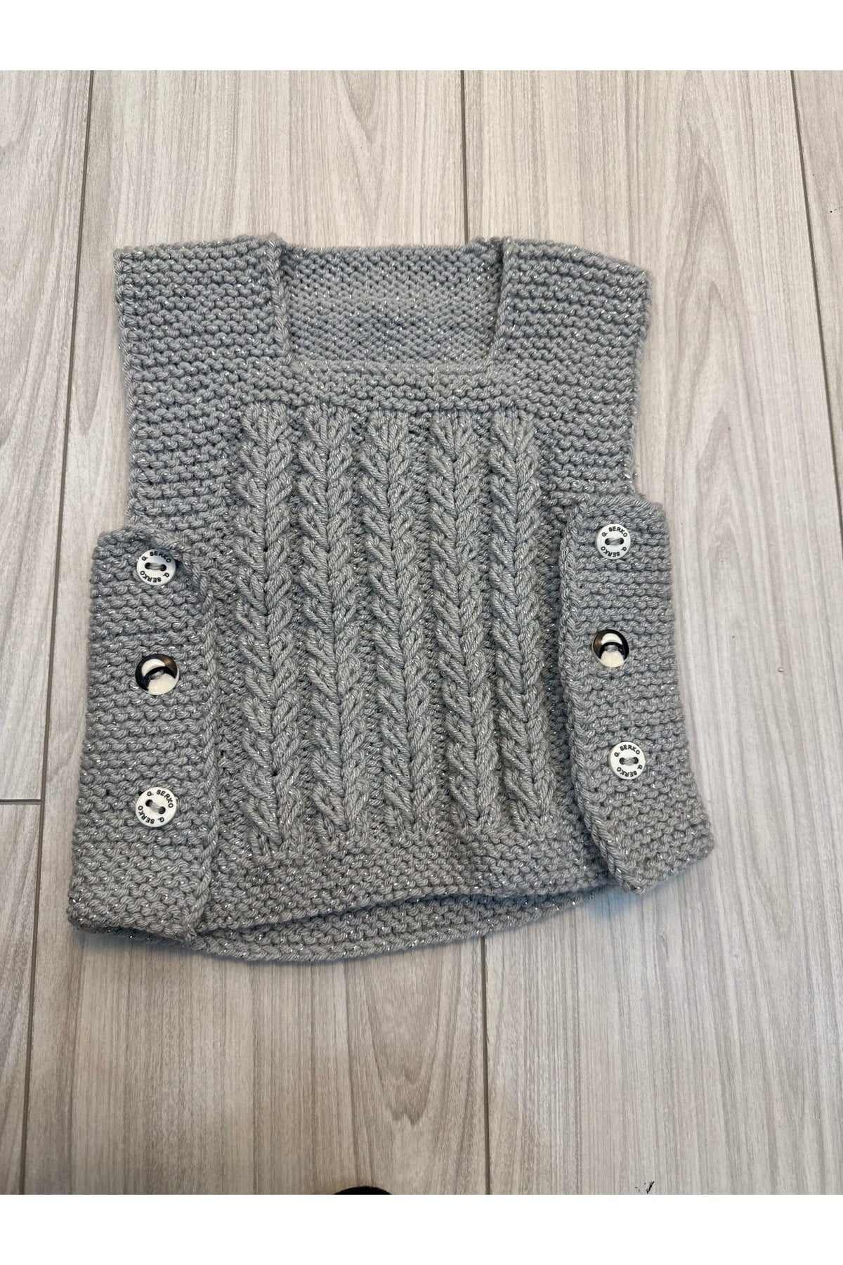 El örgüsü bebe yeleği (0-6 ay)