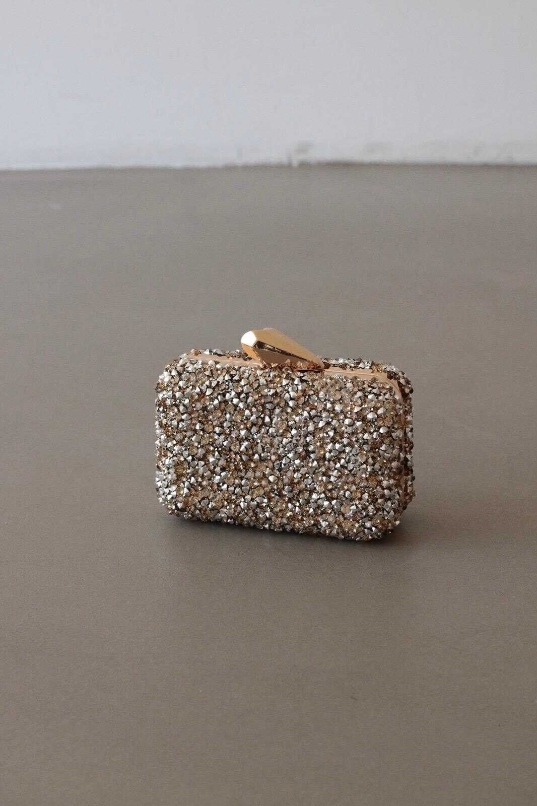 brightness-tasli-clutch-canta-gold-gum-e1dff6.jpg