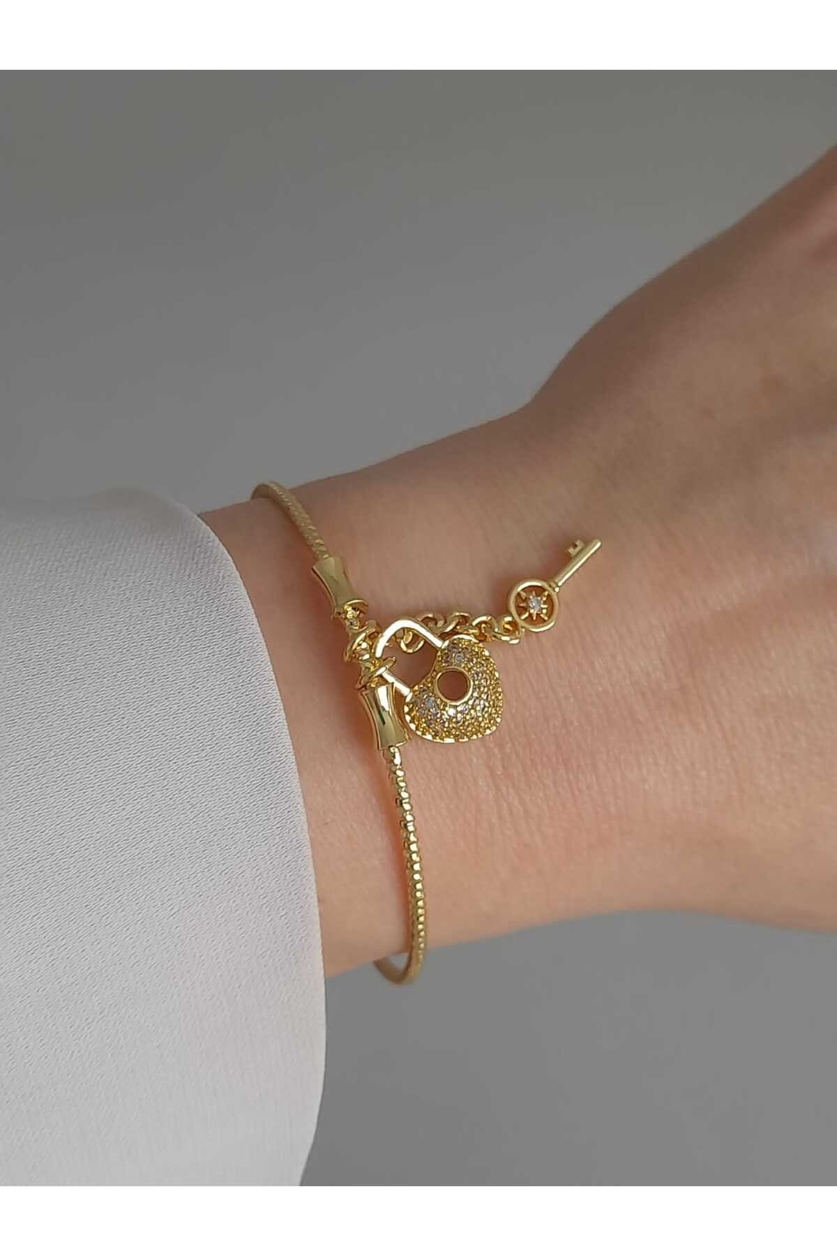 Çelik kalp anahtar gold kelepçe