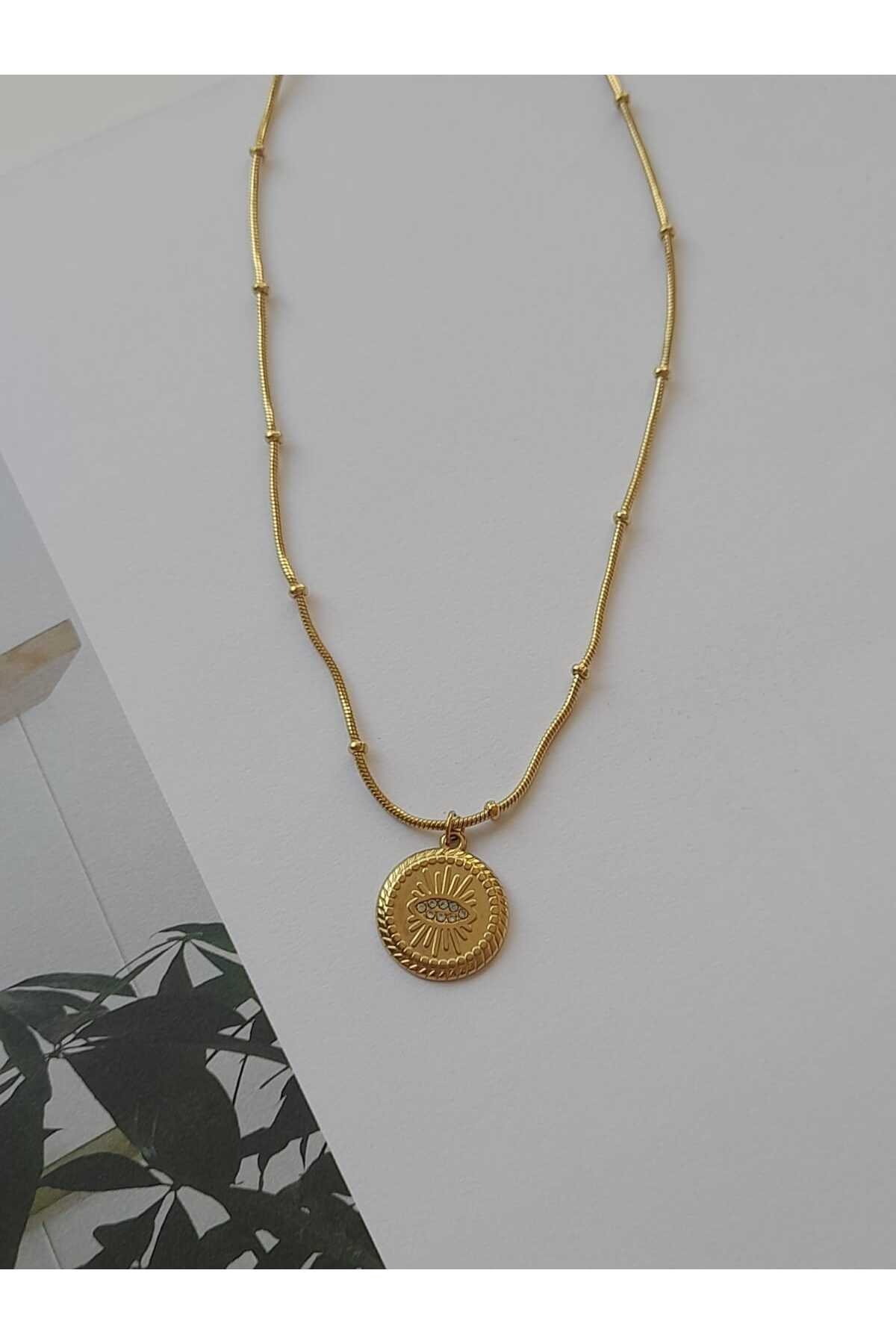 Çelik vintage göz detaylı gold kolye