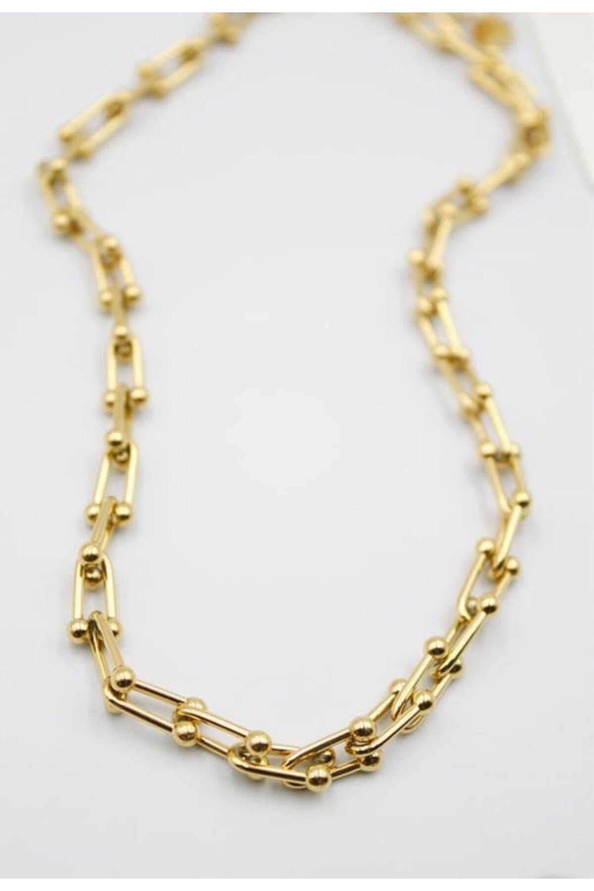 Gold tfny kolye