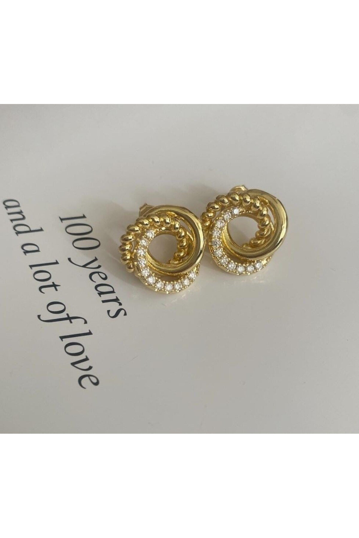 Mini düğüm gold küpe