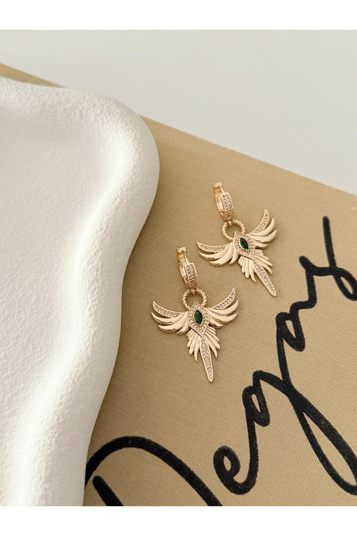 Yesil taş anka kuşu gold küpe