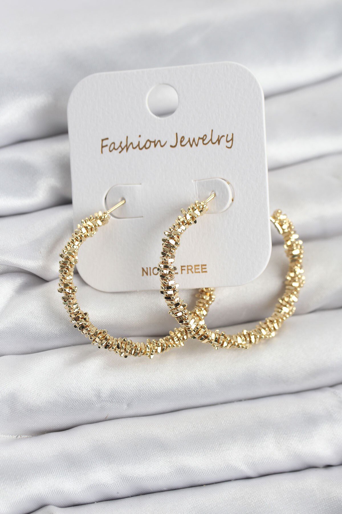 Pirinç Gold Renk Tırtıklı Halka Model Kadın Küpe