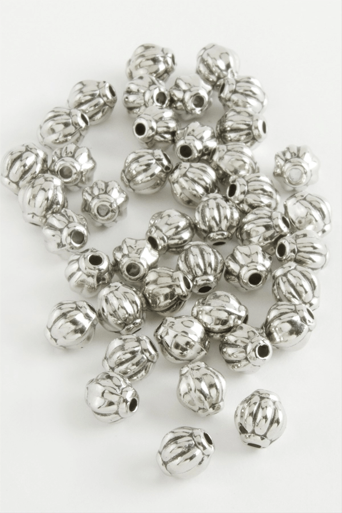0,6 mm Çizgili Oval Plastik Tesbih Püskül Ara Aparatı 50 Gram