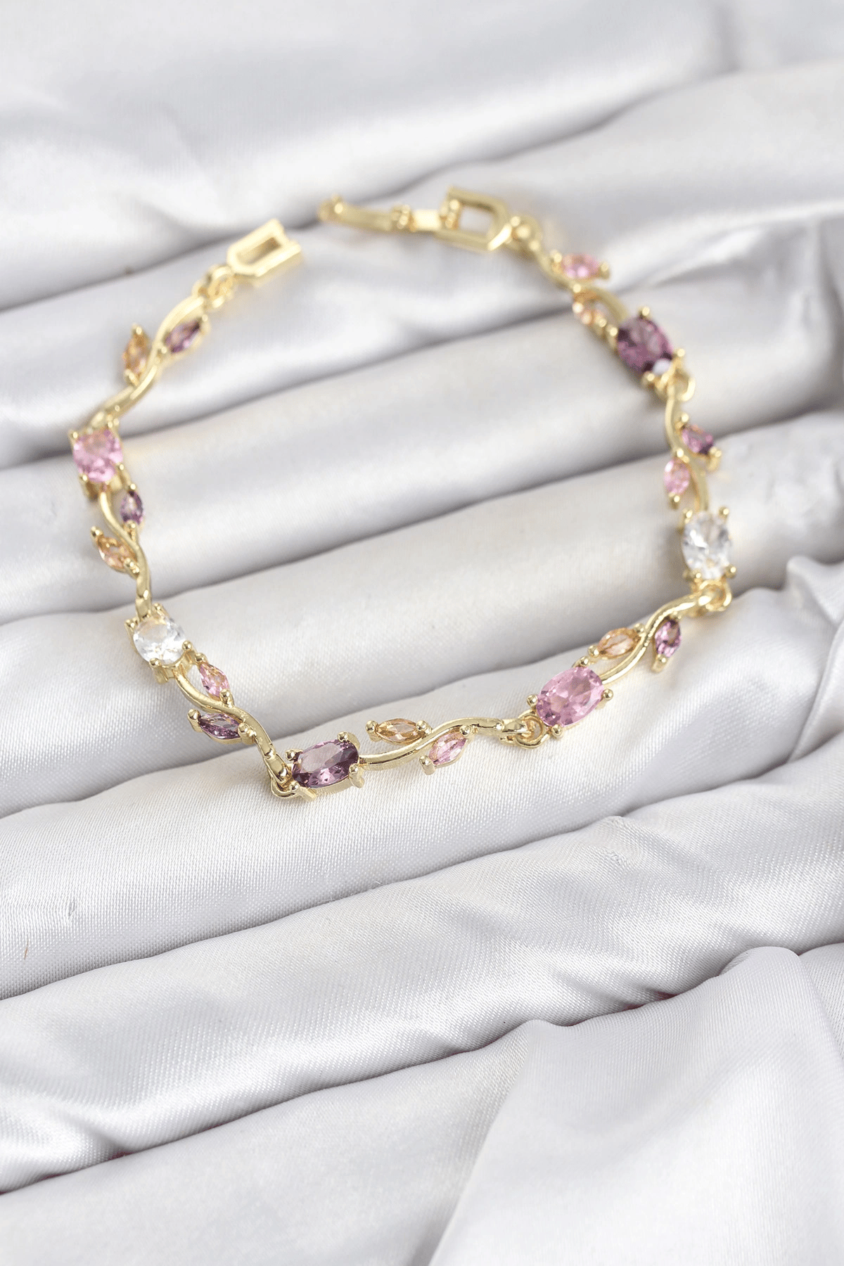 Pirinç Gold Renk Pembe ve Mor Zirkon Taşlı Çiçek Model Kadın Bileklik