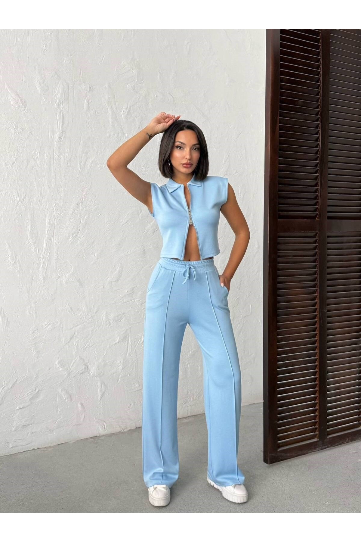 Kadın Polo Yaka Fermuarlı Crop Yelek ve Geniş Paça Çimalı Pantolon İkili Takım