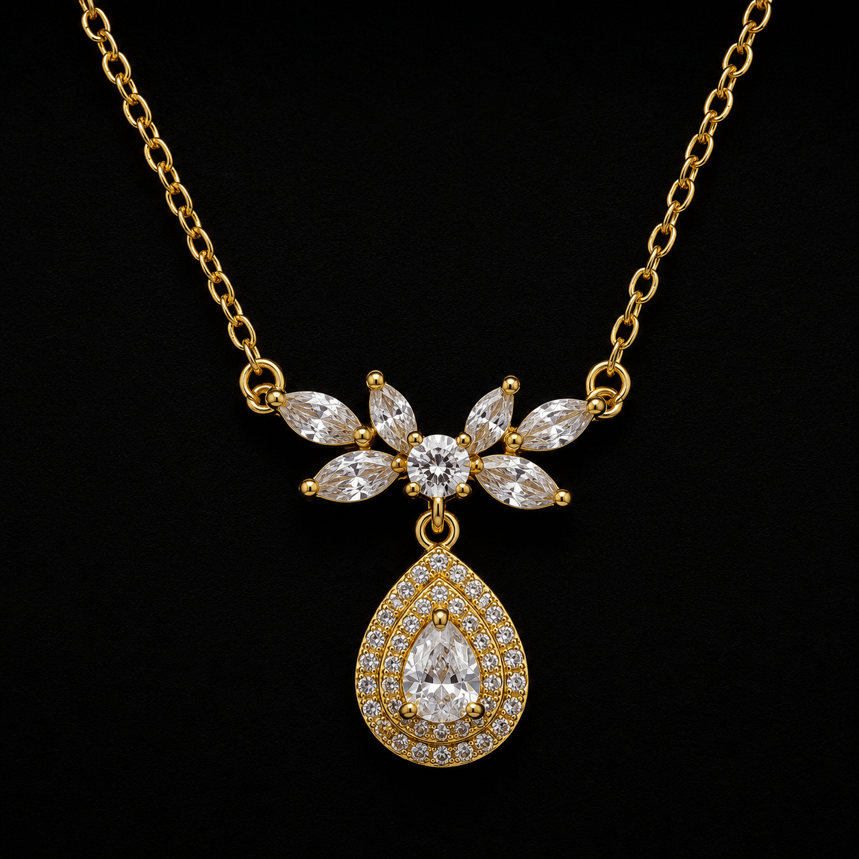 Zirkon Taşlı Damla Sallantılı Gold Kolye – Zarif Yaprak Detaylı Model