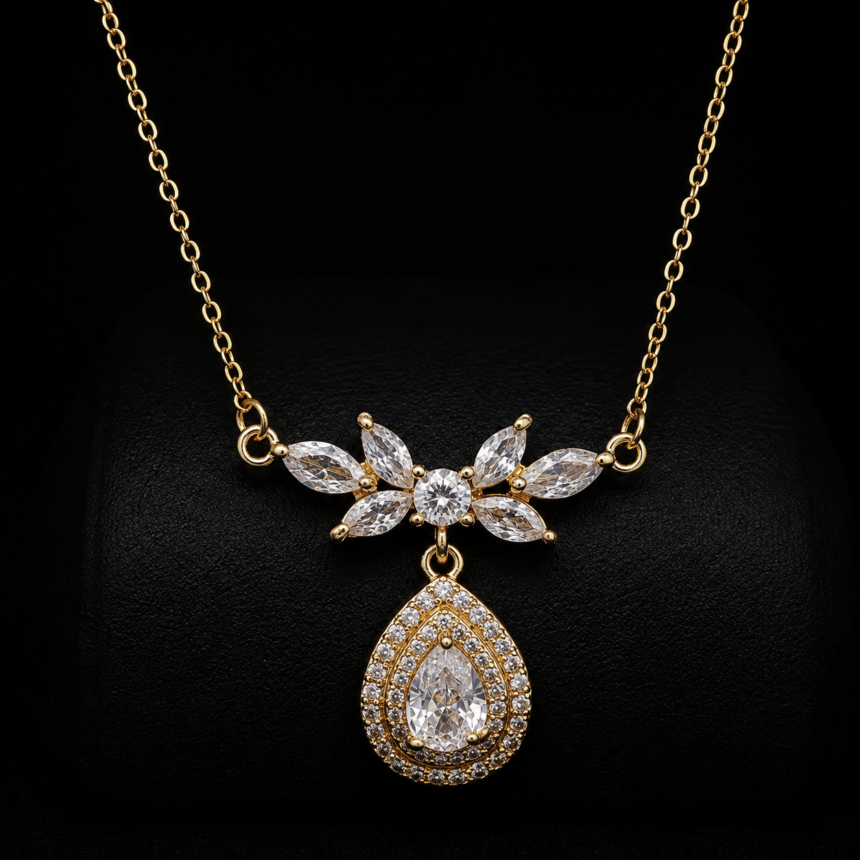Zirkon Taşlı Damla Sallantılı Gold Kolye – Zarif Yaprak Detaylı Model